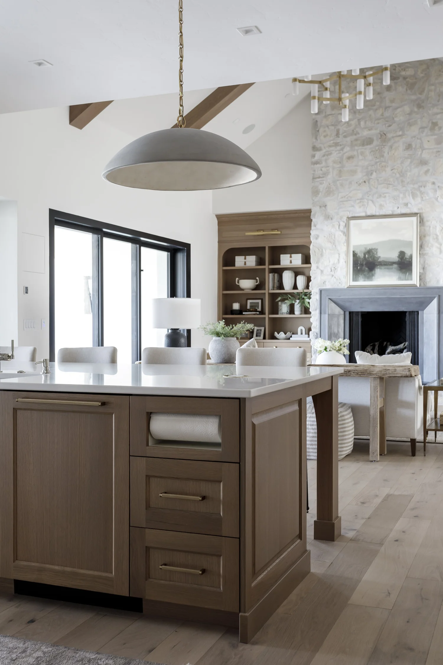 island, vaulted ceiling, fireplace beyond