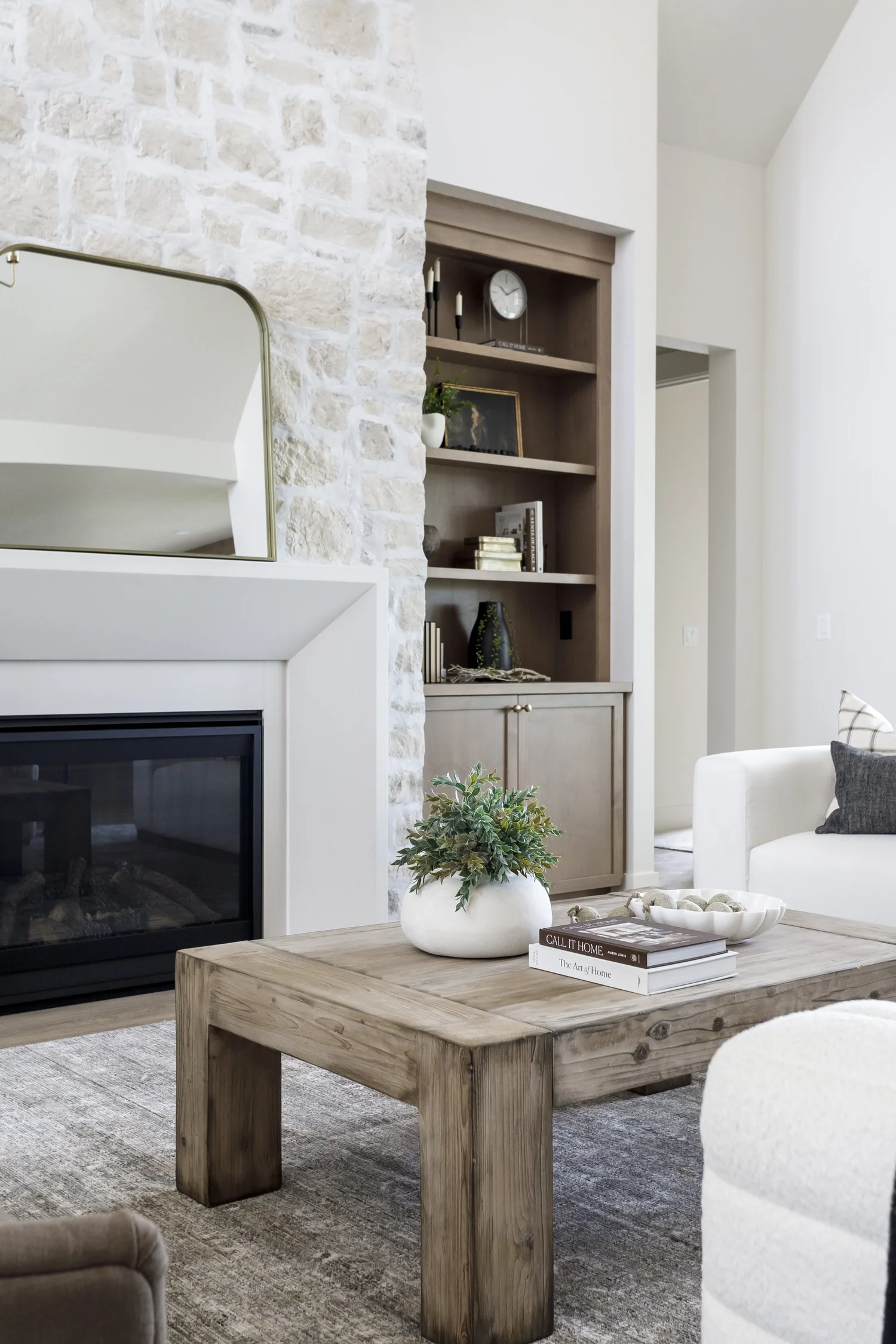 Stone fireplace with sage shiplap built-ins, interior photograph 4 of 10 by Andi Marshall Interiors