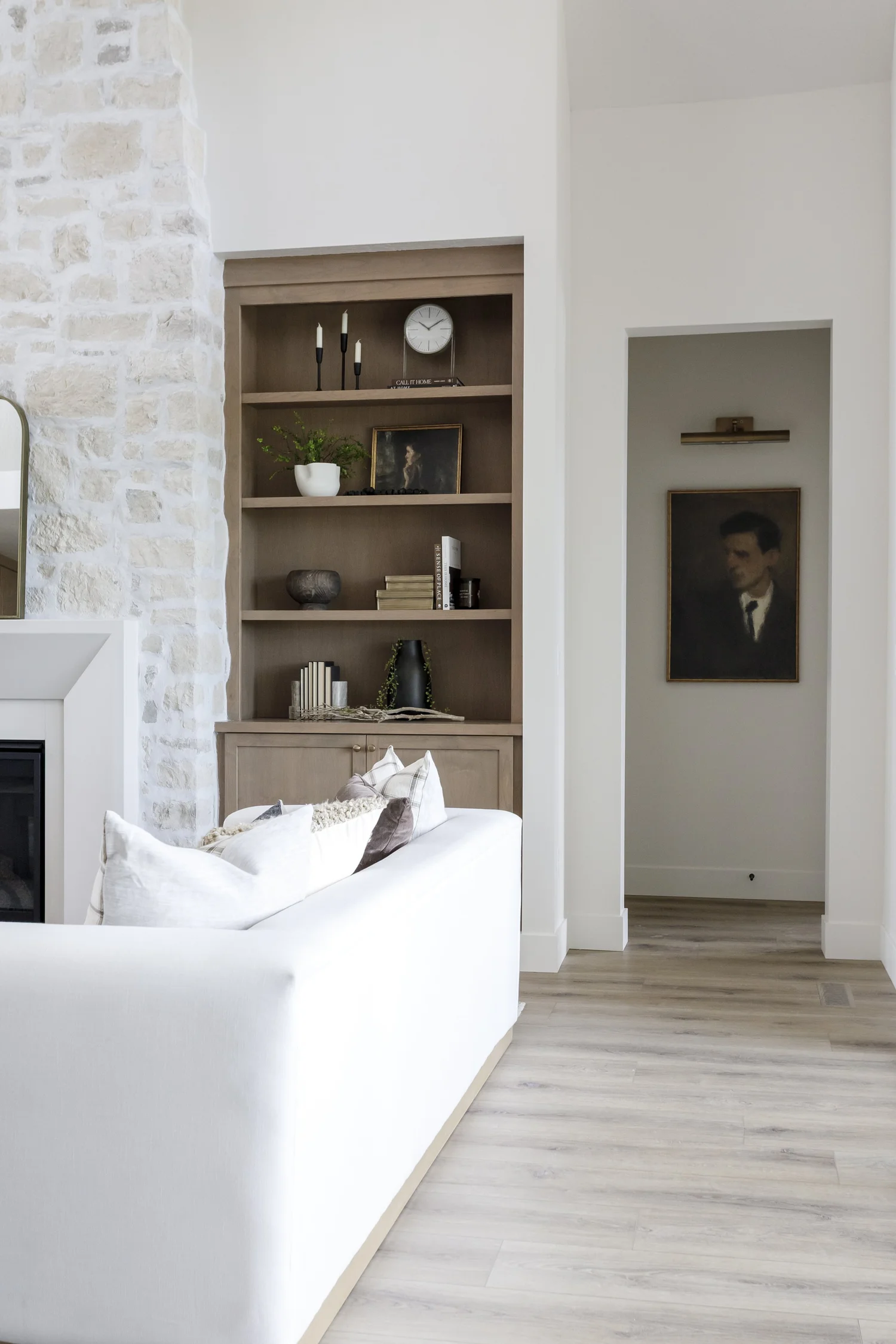 Stone fireplace with sage shiplap built-ins, interior photograph 6 of 10 by Andi Marshall Interiors