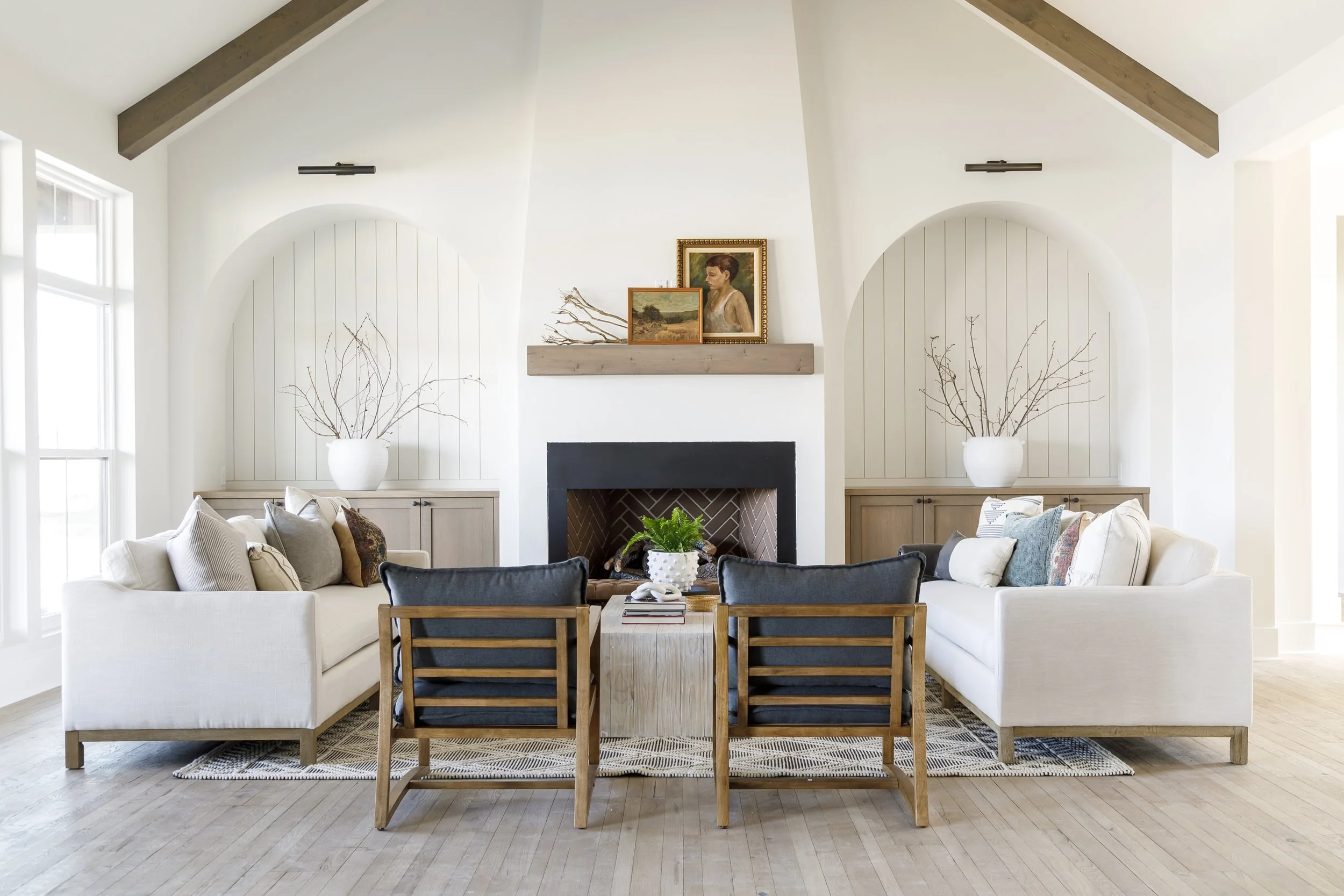 Stone fireplace with sage shiplap built-ins