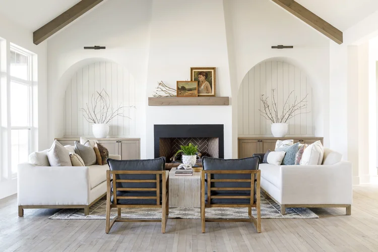 Stone fireplace with sage shiplap built-ins