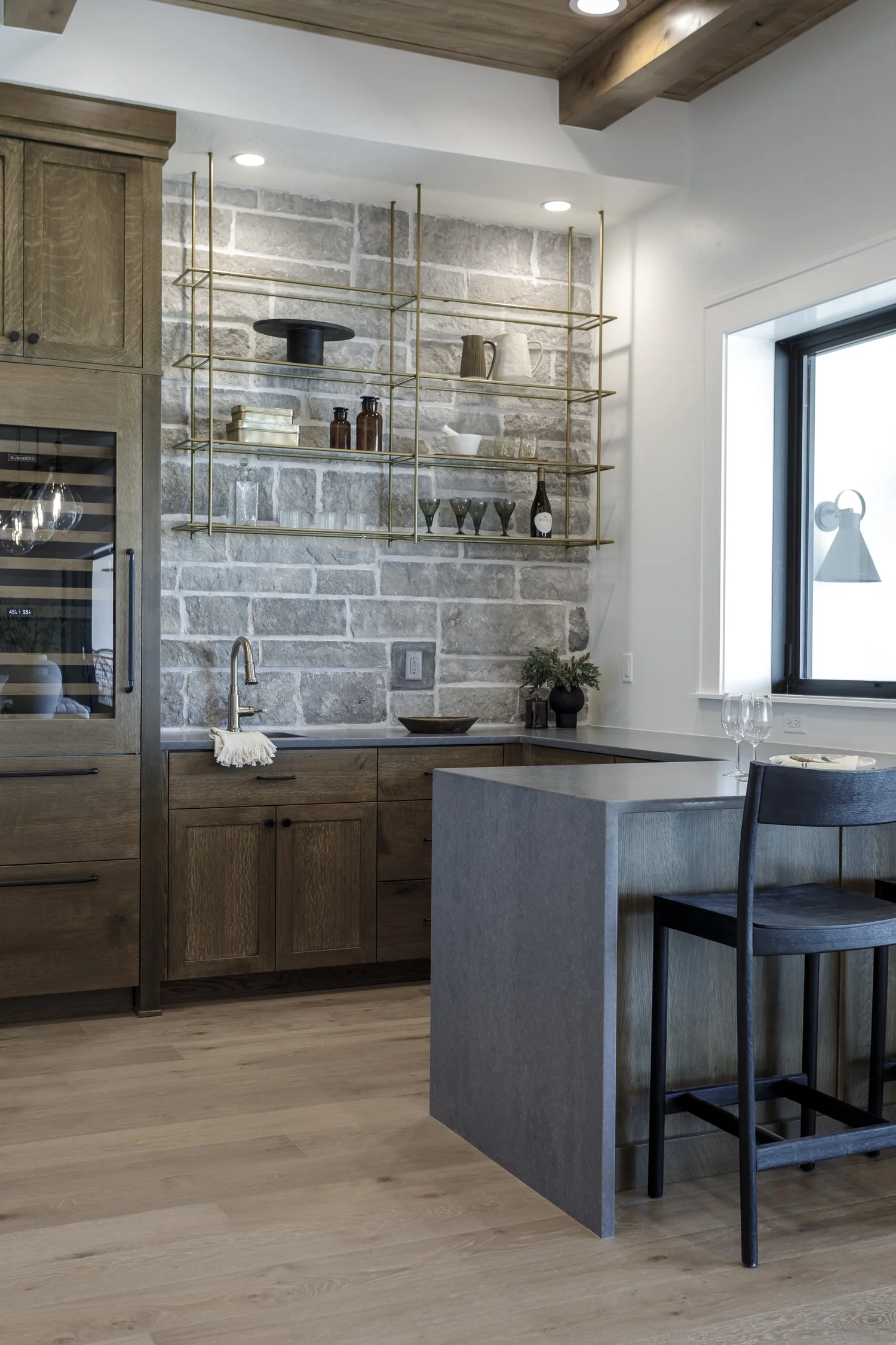 Dark-wood ceiling great room and kitchen, interior photograph 4 of 9 by Andi Marshall Interiors