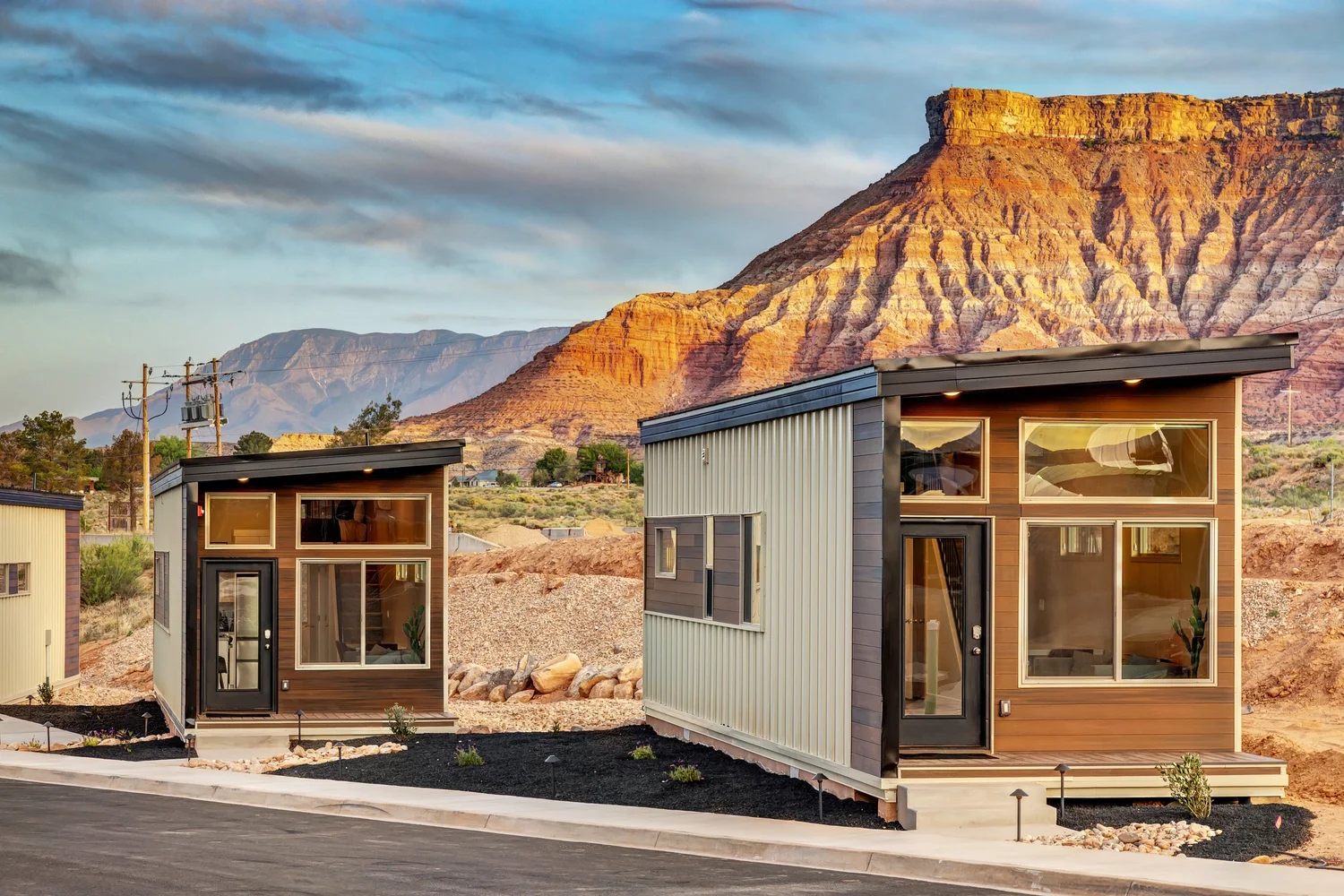 Cabins at The Riv at Zion under a red-rock mesa