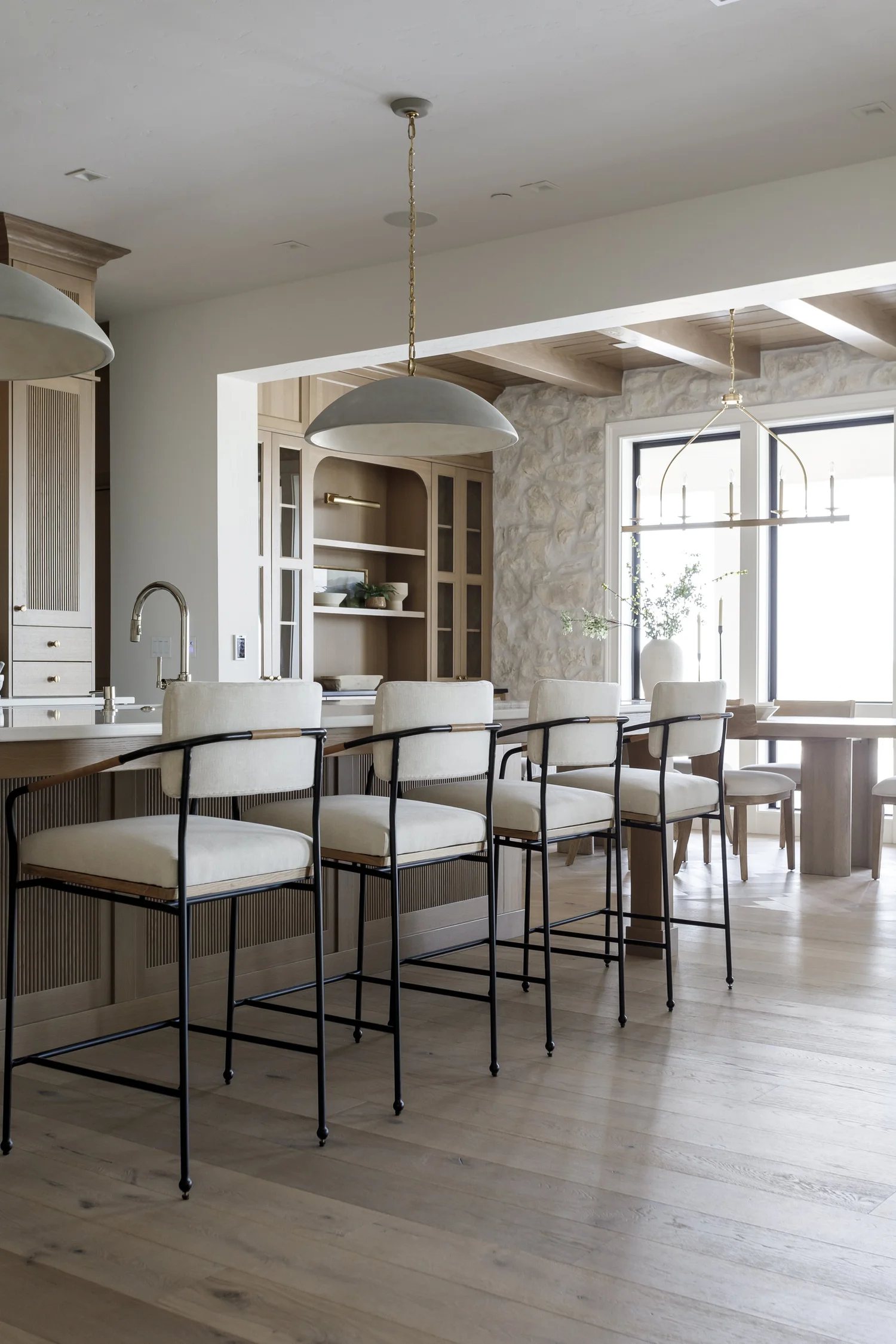 Herringbone floors, oak island and stone fireplace, interior photograph 7 of 12 by Andi Marshall Interiors