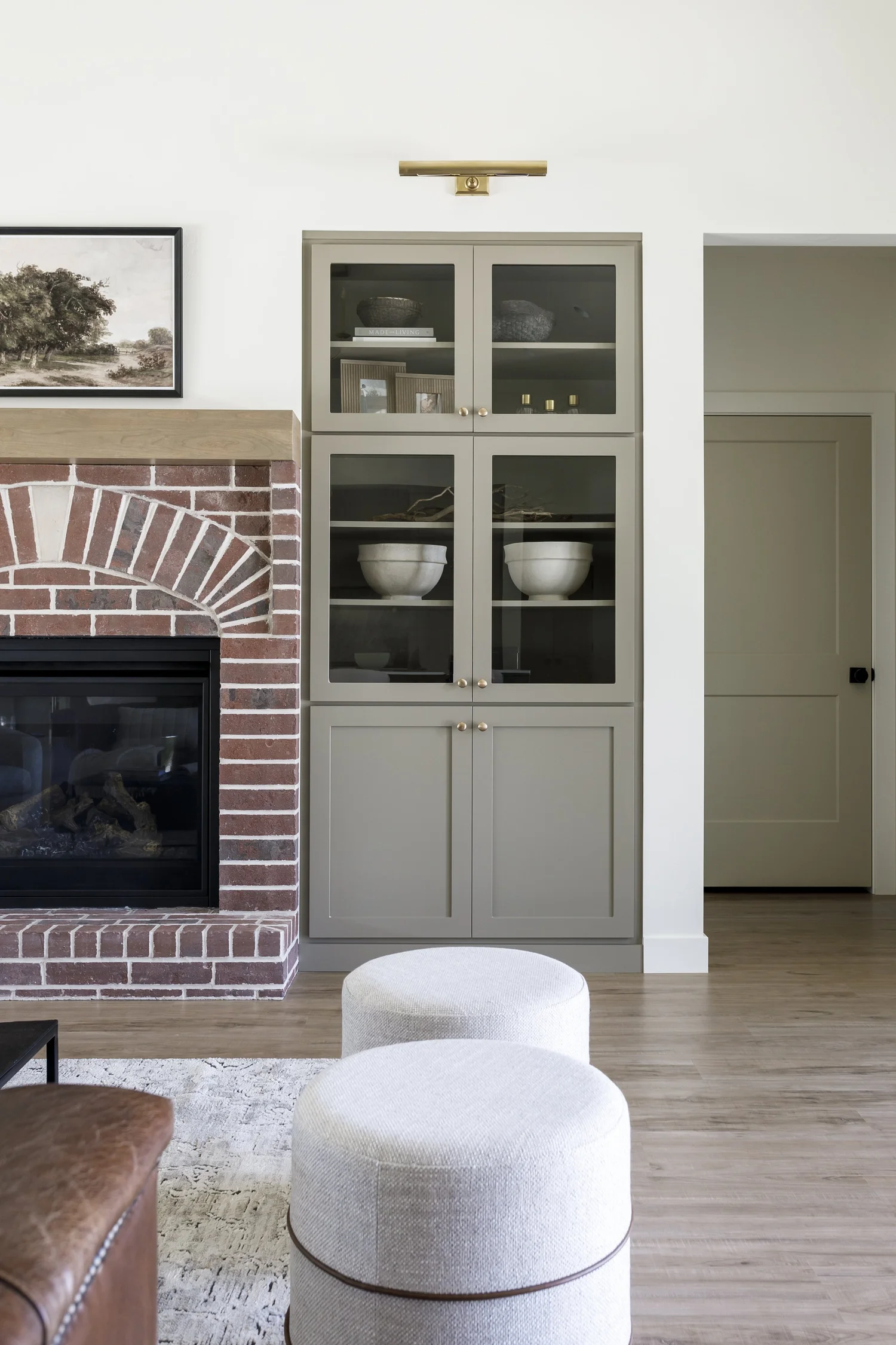 Brick fireplace with sage built-ins, interior photograph 4 of 5 by Andi Marshall Interiors