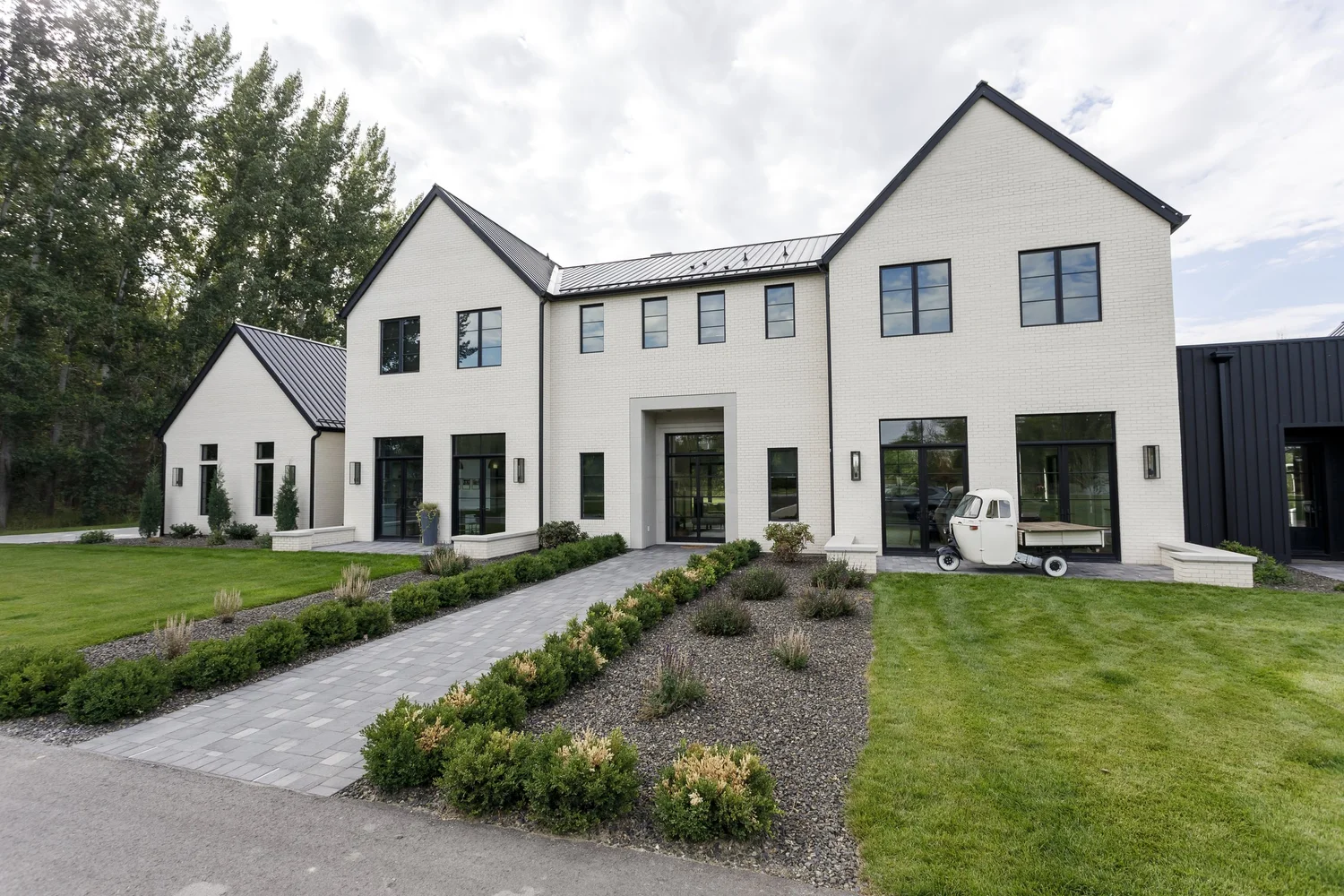 Modern white farmhouse with black steel windows, interior photograph 1 of 13 by Andi Marshall Interiors