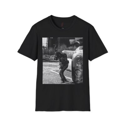 Black T-shirt with a black and white photo of a person in camouflage clothing aiming a gun at a police officer.