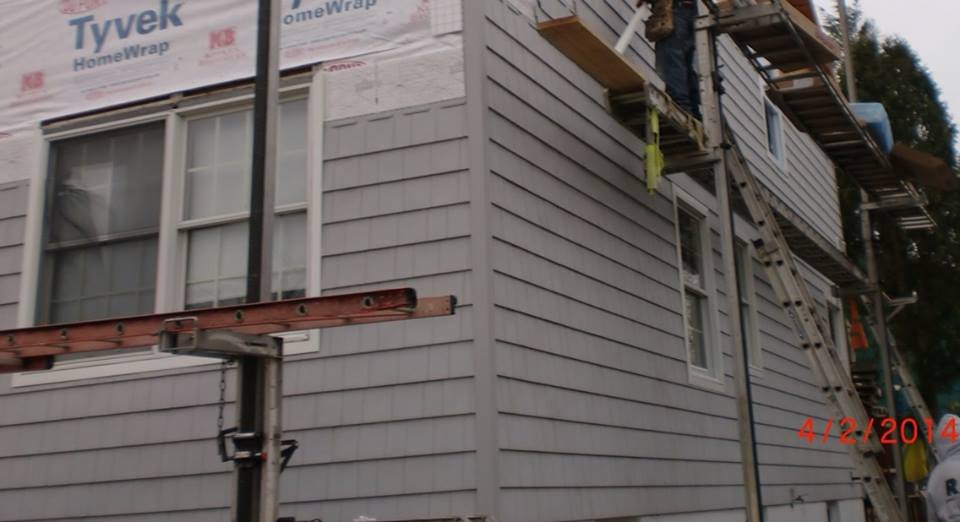 67 Siding installation.jpg