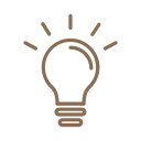 Illustration of a light bulb with lines indicating light rays