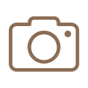 A camera icon with a brown outline.
