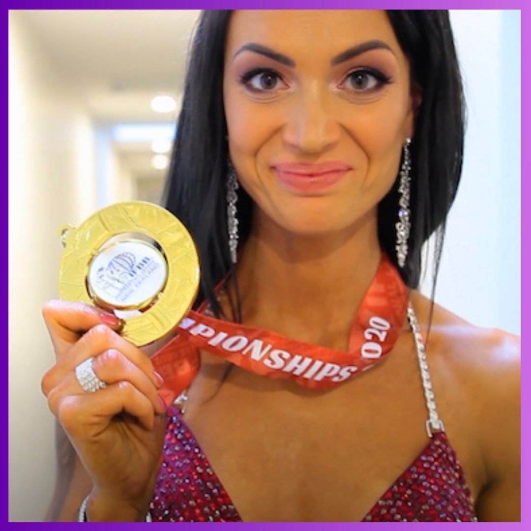 Award-winning fitness coach Barbora Hojdikova with IFBB medals in Christchurch NZ
