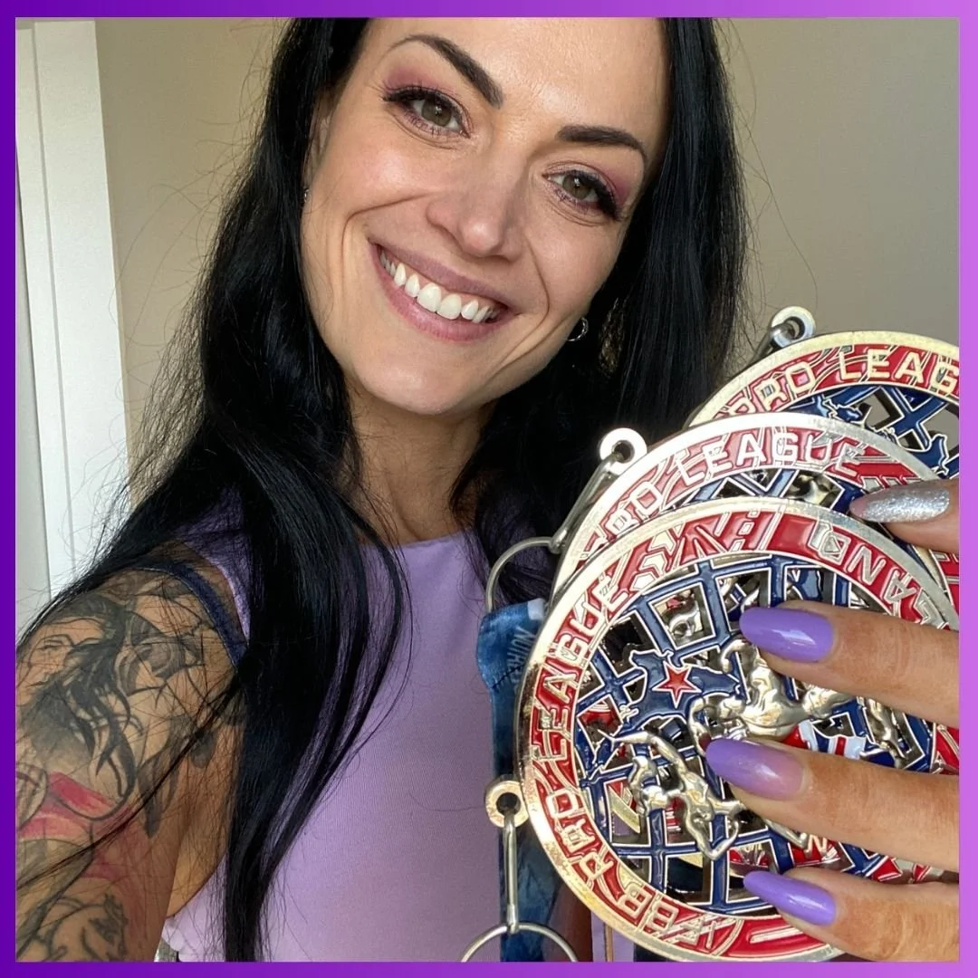 Award-winning fitness coach Barbora Hojdikova with IFBB medals in Christchurch NZ