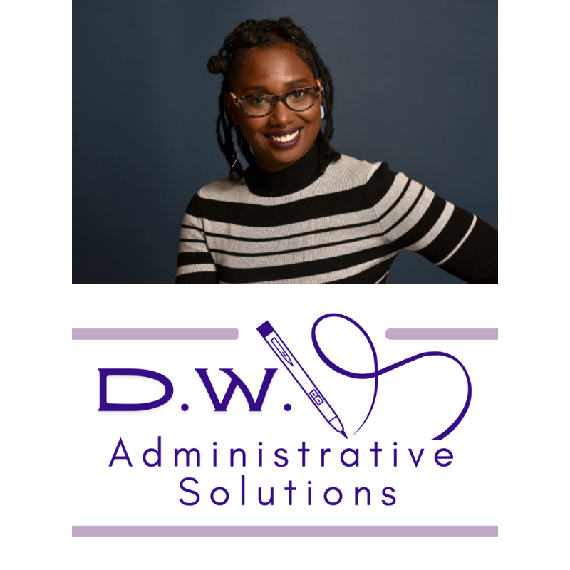 A smiling Black woman with glasses and earrings, wearing a black and white striped turtleneck, poses against a dark blue background.