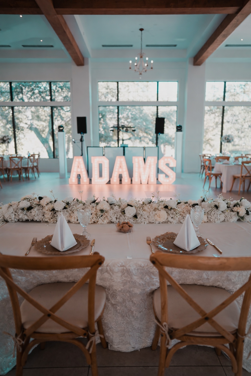 Elegant wedding reception with _ADAMS_ marquee.png