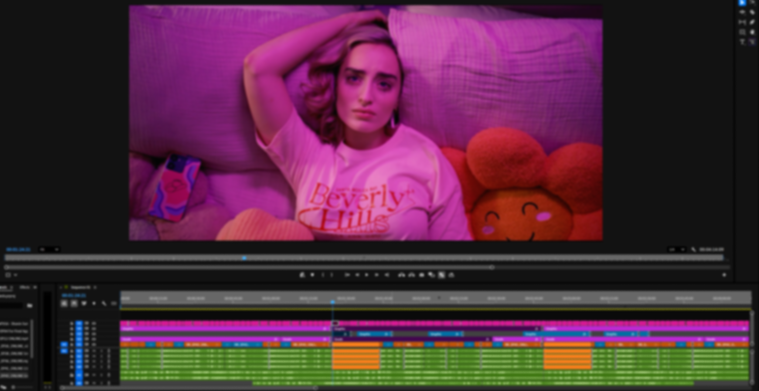 A young woman with purple hair lying on a couch with purple lighting, surrounded by stuffed animals and a cell phone nearby.