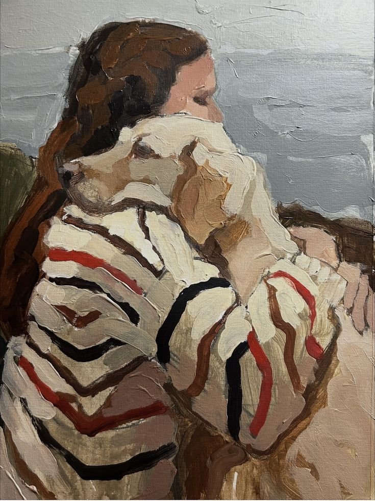A woman with long brown hair, sitting with her eyes closed, hugging a sweet white labrador. She is wearing a striped sweater with red, black, and white stripes, and appears to be in a reflective or emotional moment.