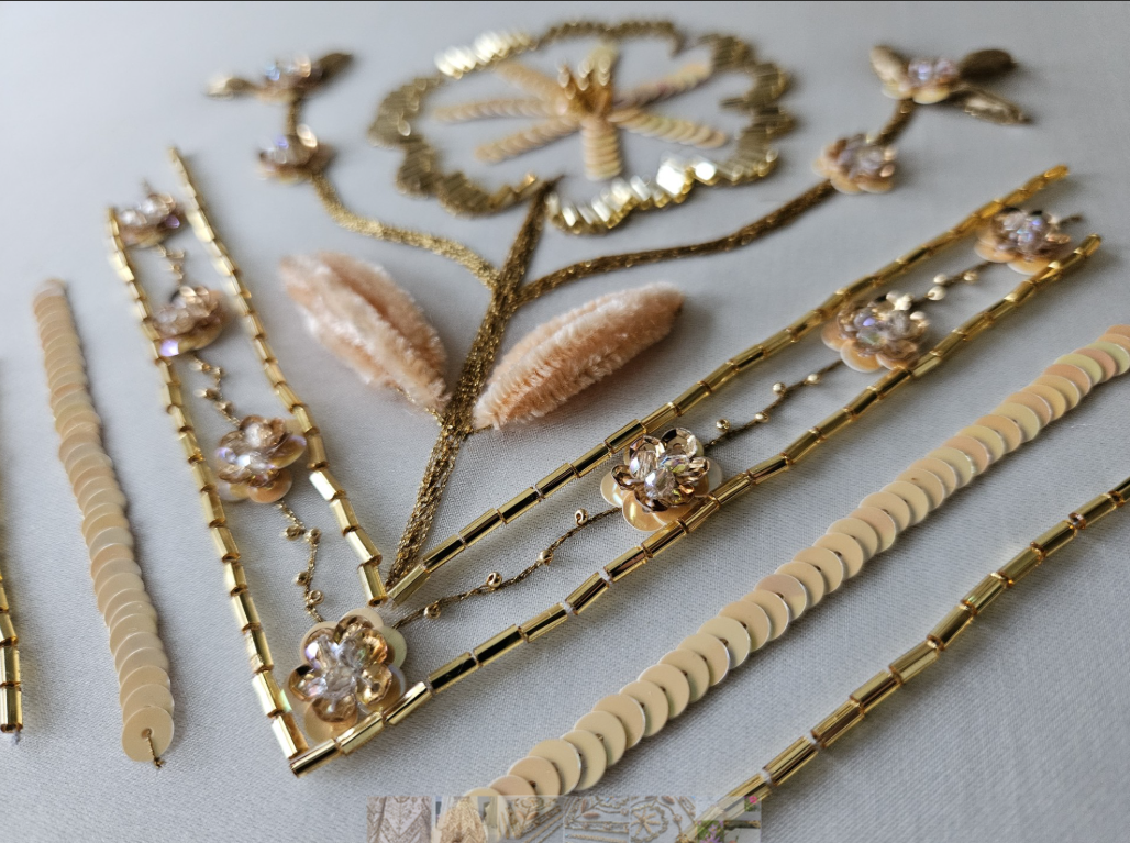 Tambour embroidery using beads, sequins, raffia and chenille thread.