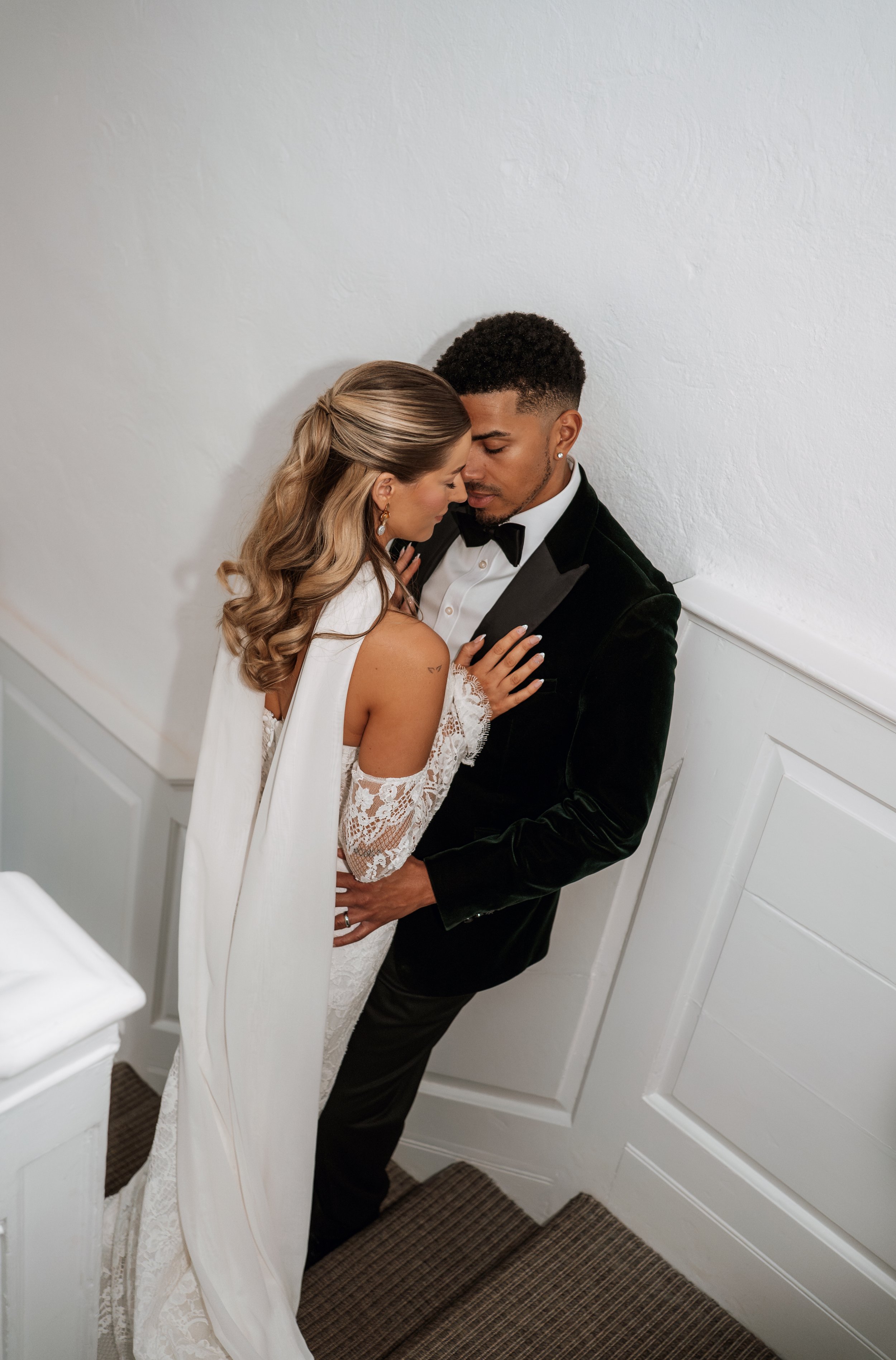 gemma-wythe-photography-butley-priory-staircase-couple-portrait..jpg