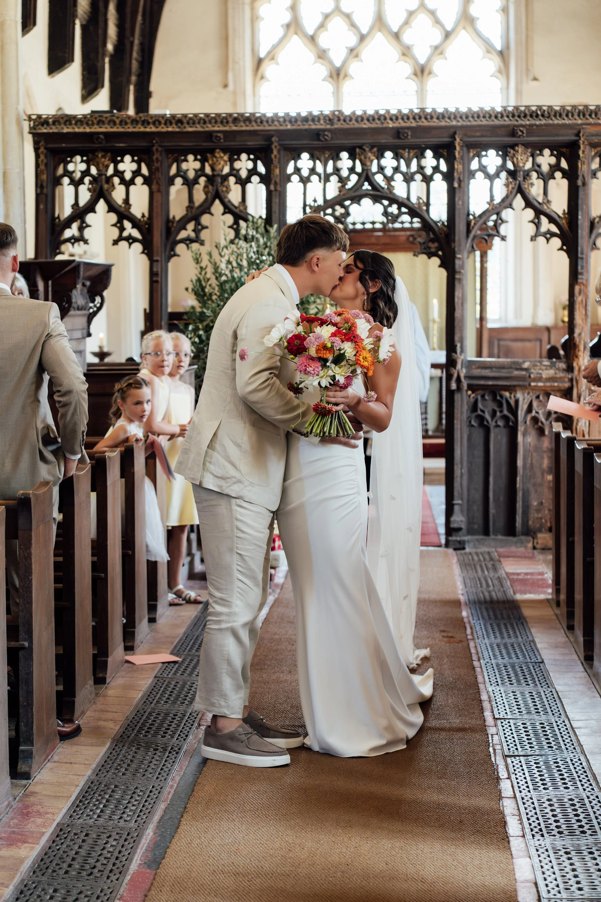 gemma-wythe-photography-first-kiss-bride-and-groom.jpg