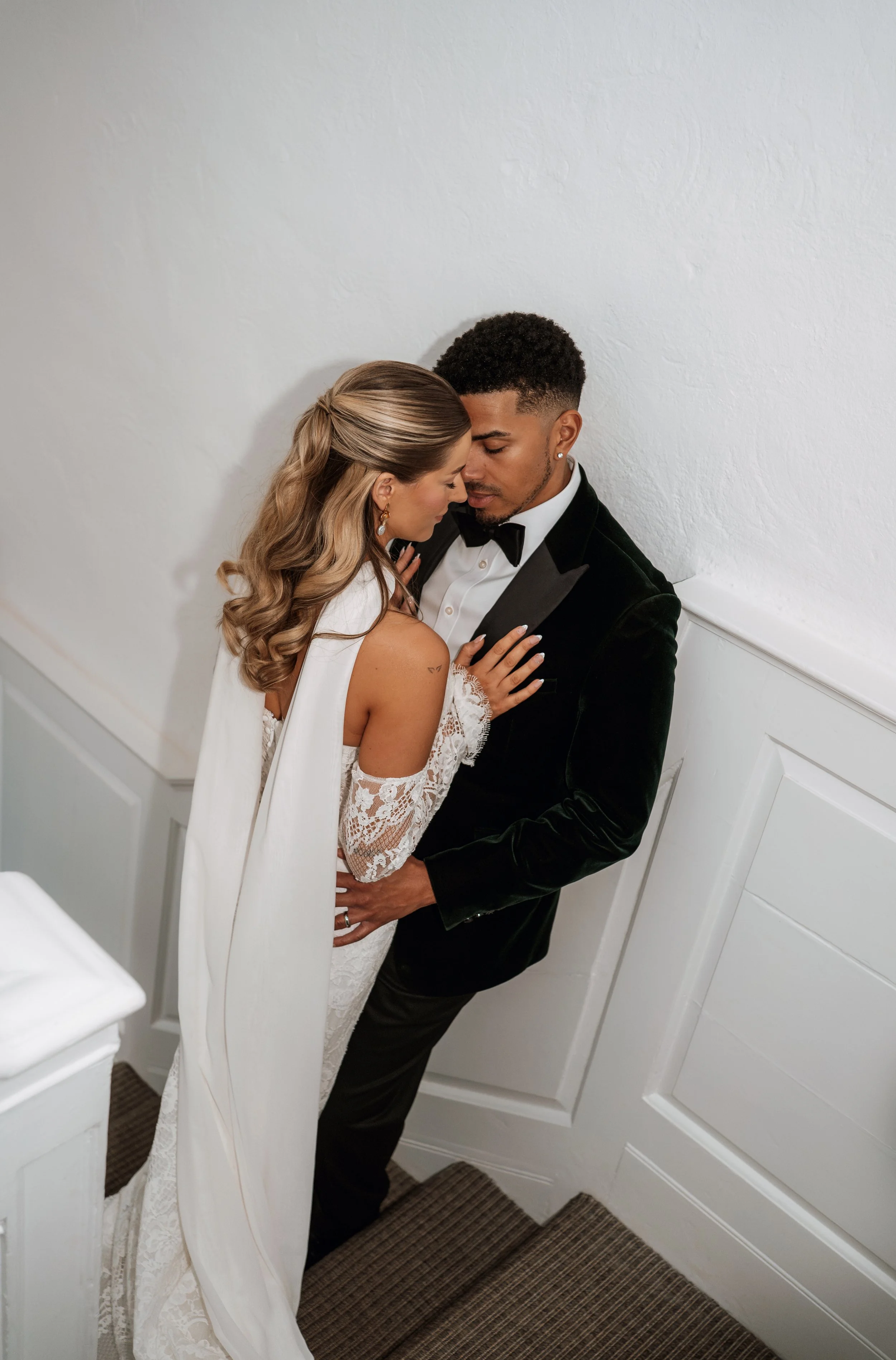 gemma-wythe-photography-butley-priory-staircase-couple-portrait..jpg