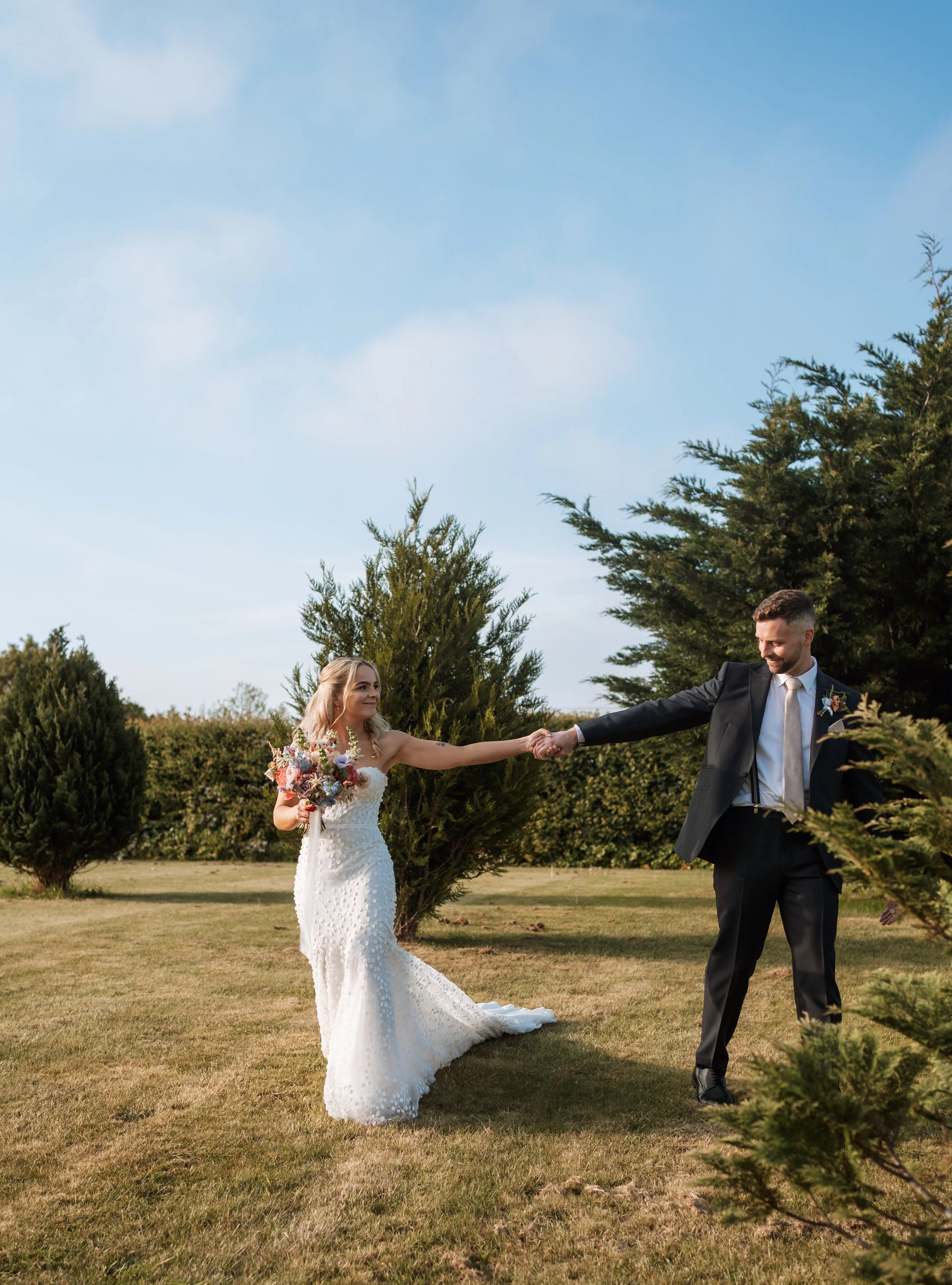gemma-wythe-photography-norfolk-wedding-couple-walking.jpg