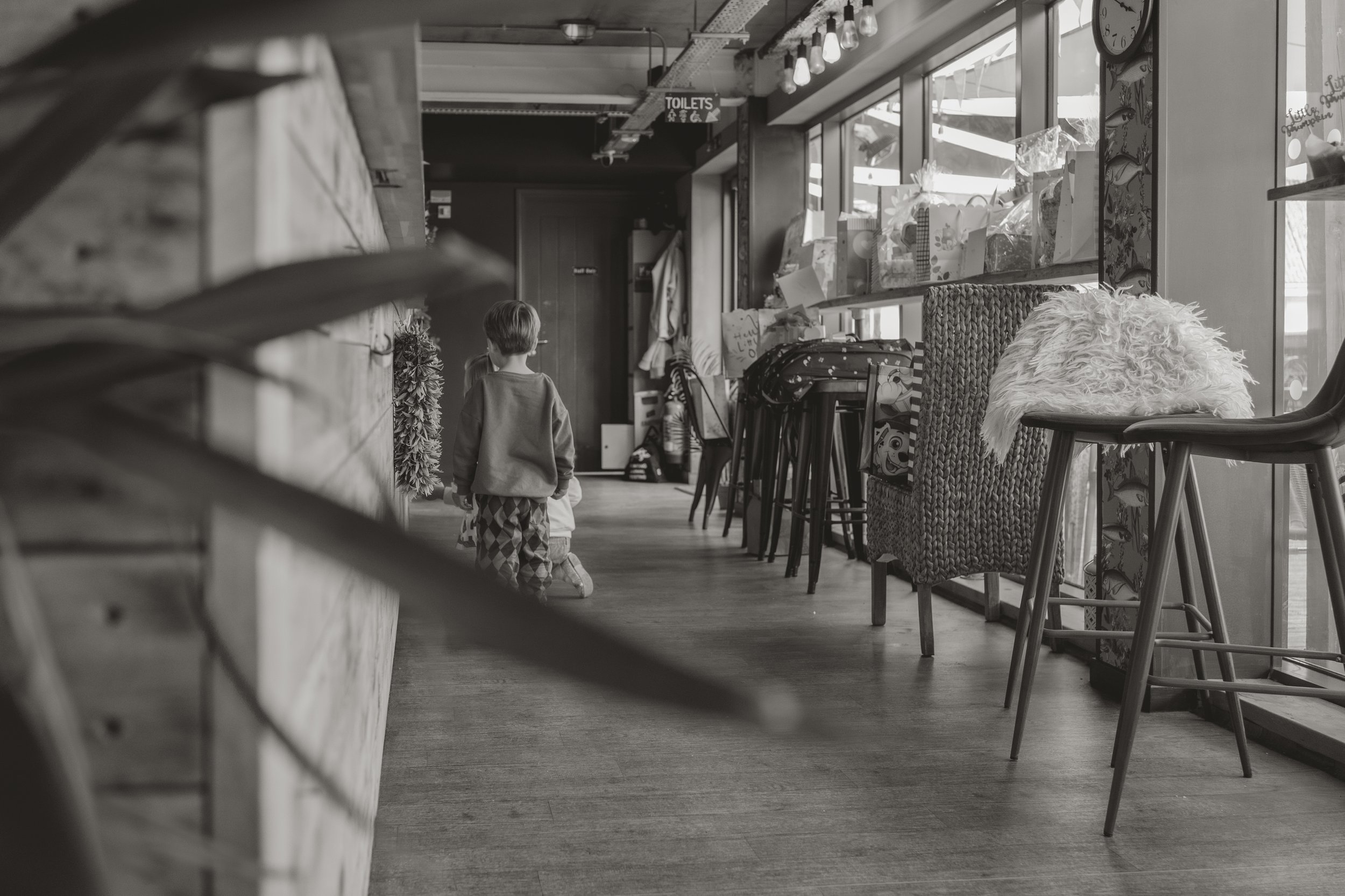 Candid baby shower event photography at The Boathouse in Woodbridge, Suffolk, capturing the relaxed atmosphere and venue details, photographed by Gemma Wythe Photography.