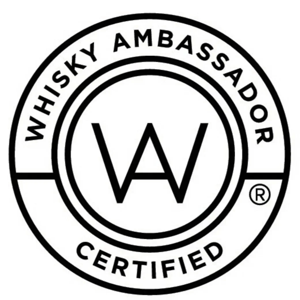 A black and white circular logo with the text 'WISPY AMBASSADOR' on the top arc and 'CERTIFIED' on the bottom arc, with a large letter W in the center.
