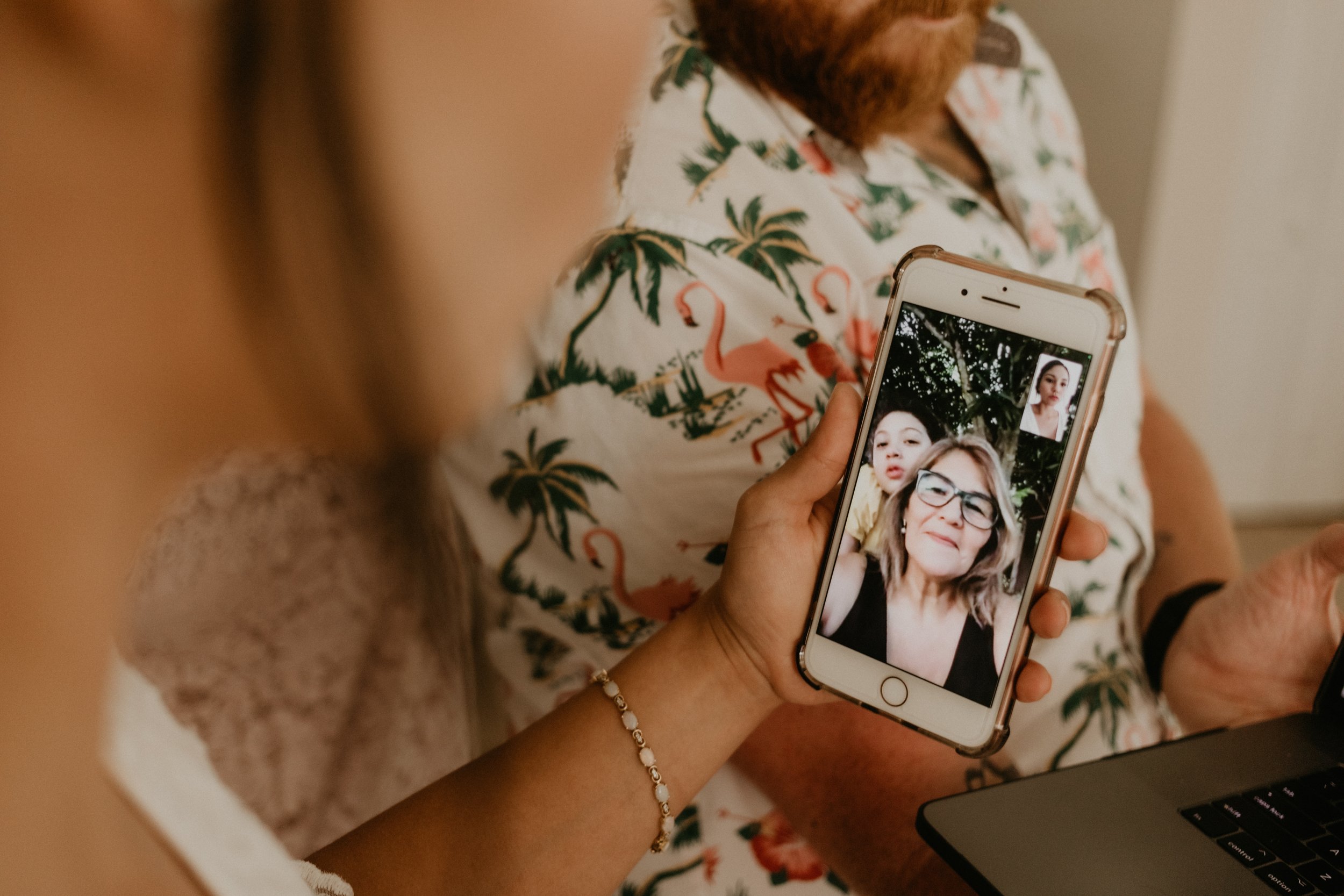 The bride FaceTimes with her family in Columbia