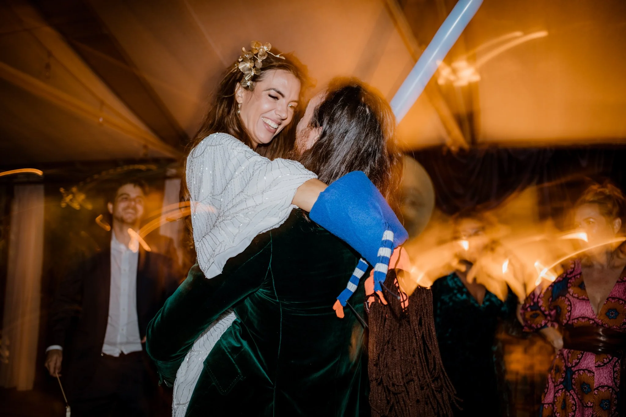 Lindsey and Dune dance on their dance floor with inflatable balloon animals and their custom puppets