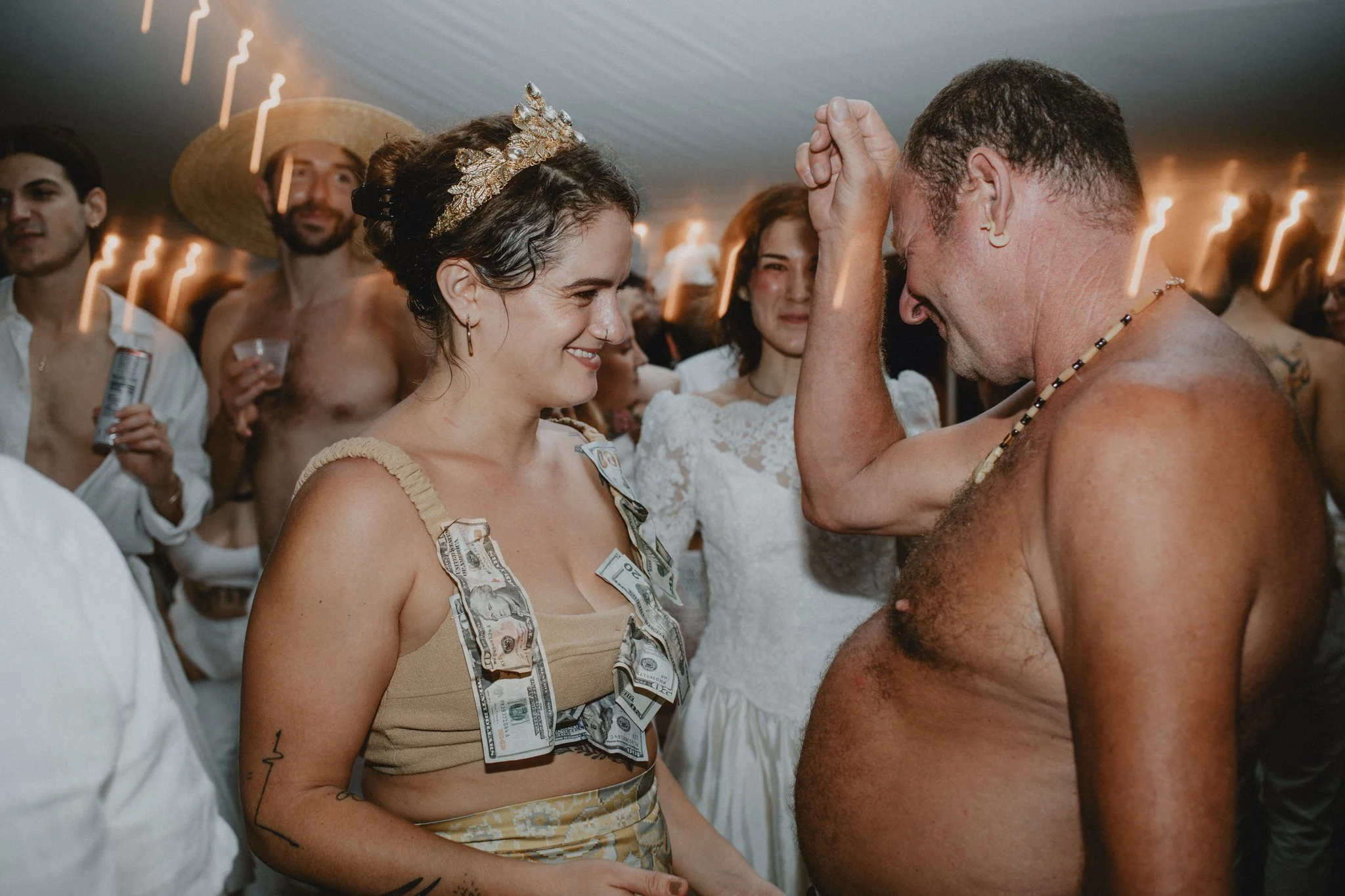 Zena has money pinned to her, during a New Orleans tradition