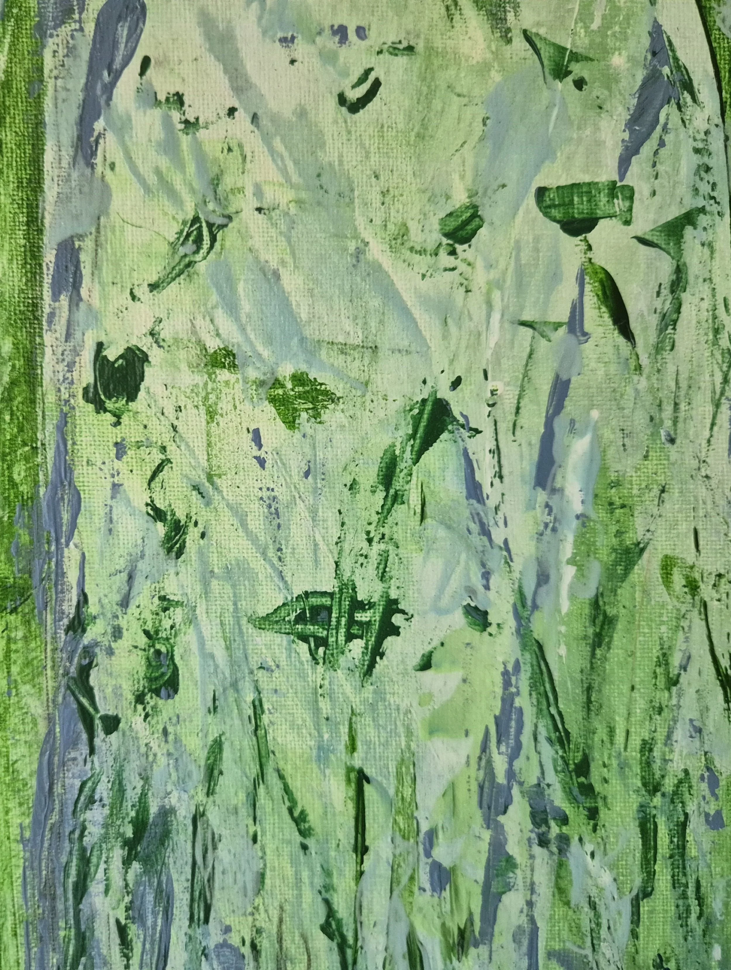 Close-up of layered green and blue paint showing expressive brushwork and surface texture.