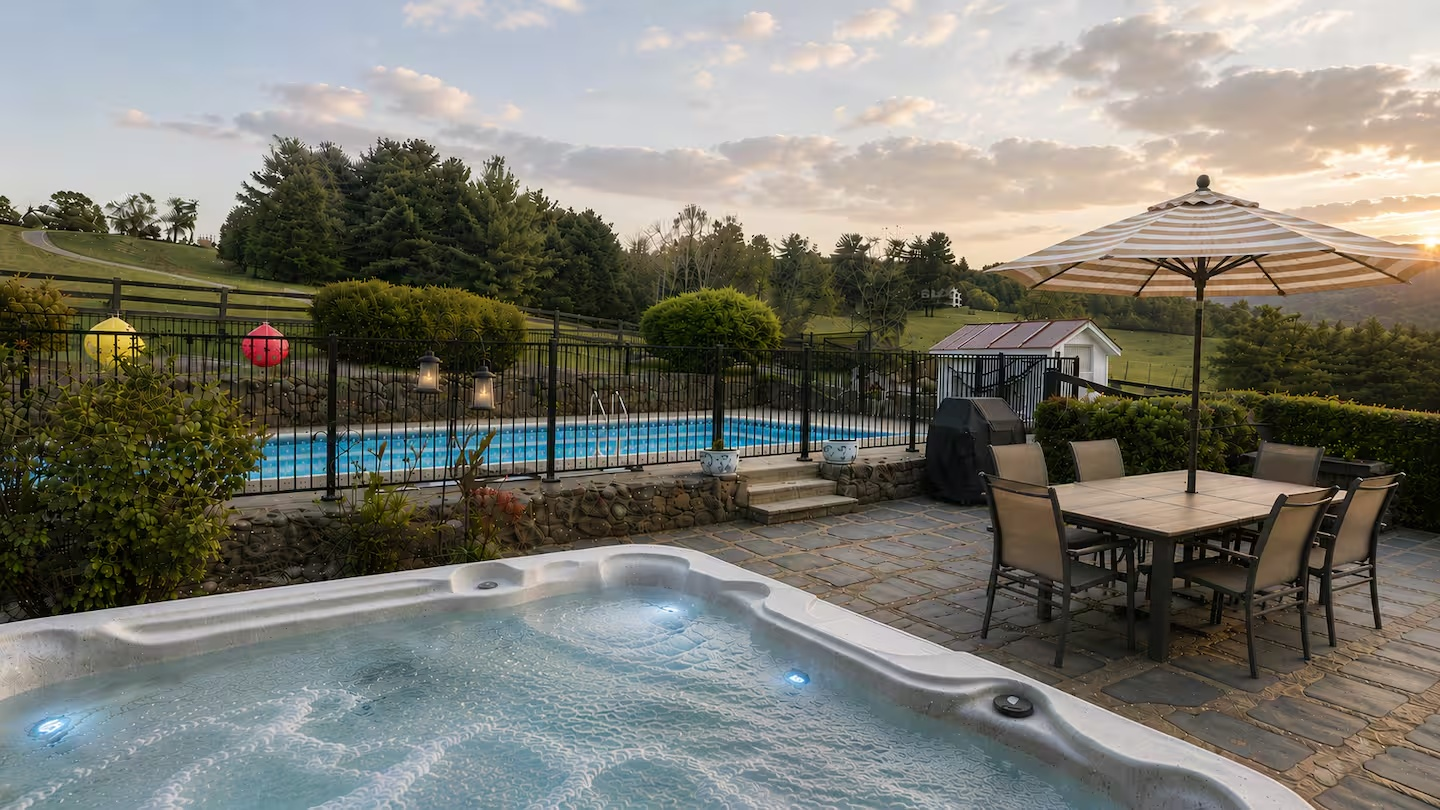 60-the-heritage-house-hot-tub-pool-patio-sunset.png