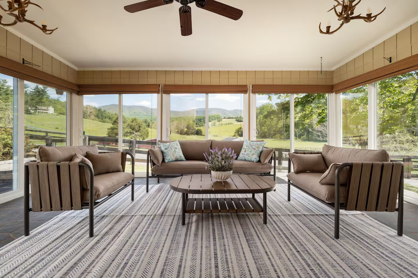 33-the-heritage-house-sunroom-lounge-mountain-view.png