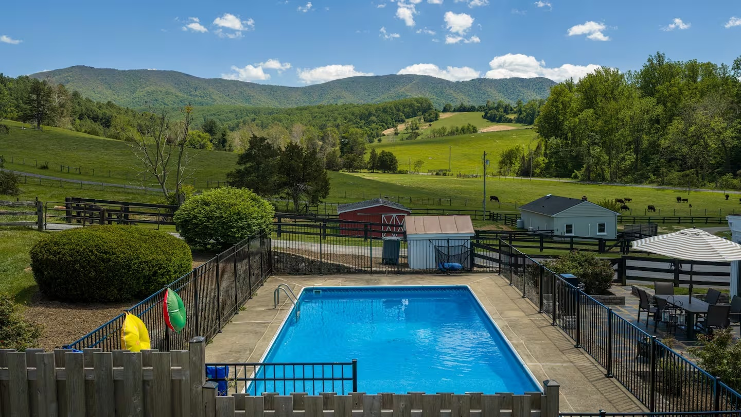 64-the-heritage-house-pool-mountain-view-aerial.png
