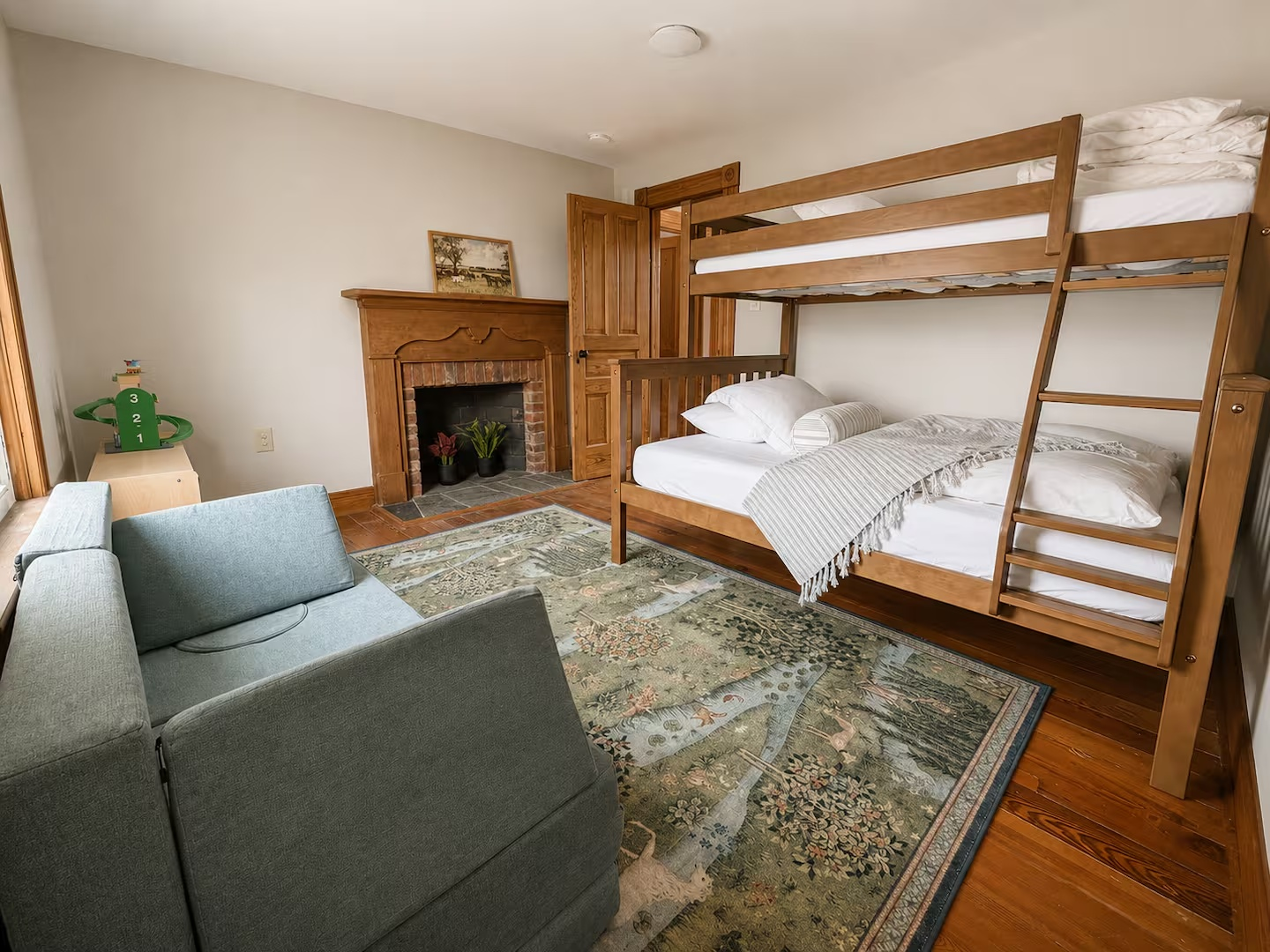 25-the-heritage-house-kids-bunk-room-fireplace.png