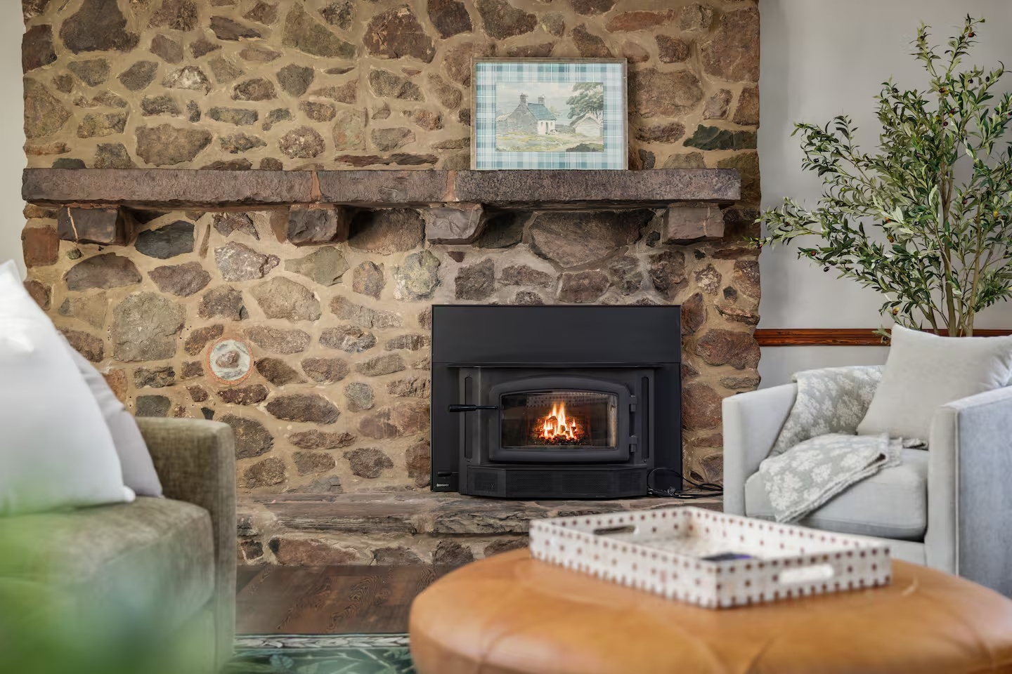 34-the-heritage-house-stone-fireplace-living-room.png