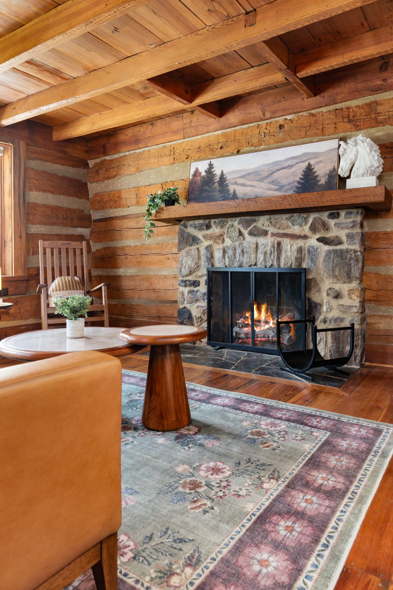 46-the-heritage-house-rustic-living-room-stone-fireplace.png