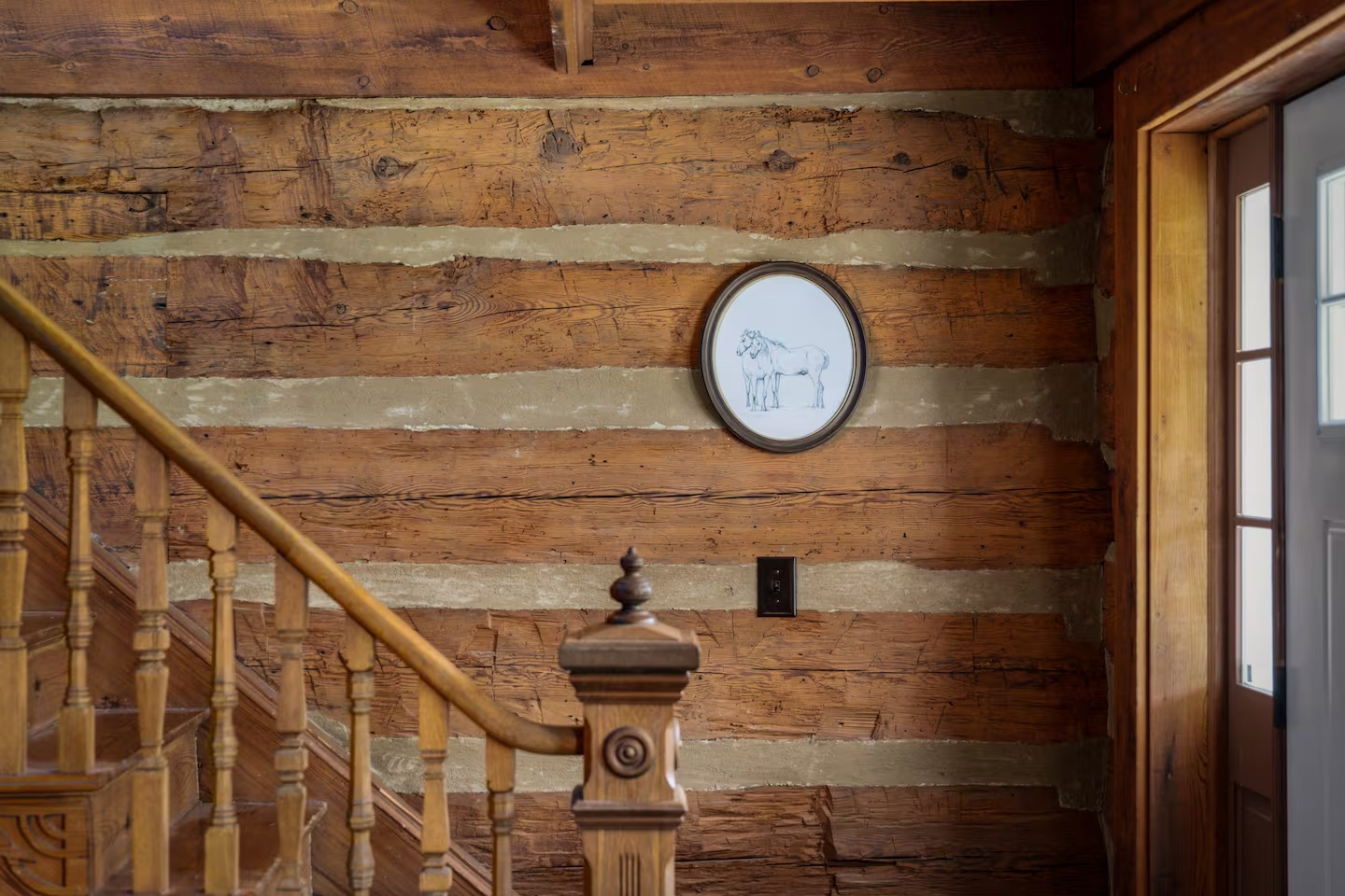 50-the-heritage-house-wood-staircase-horse-art.png