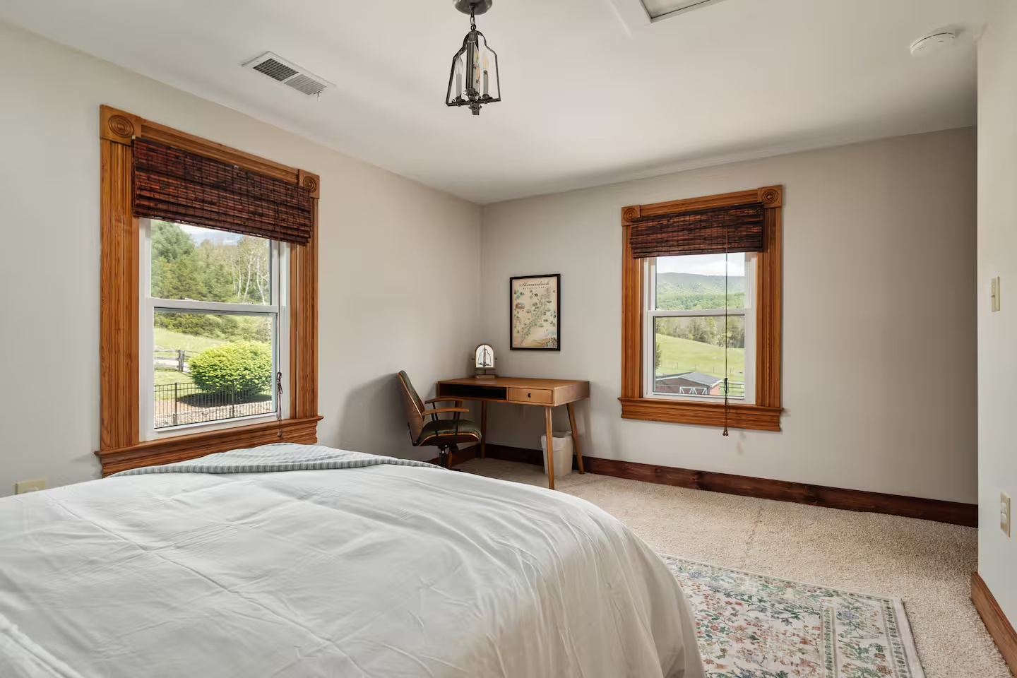 29-the-heritage-house-bedroom-workspace-mountain-view.png