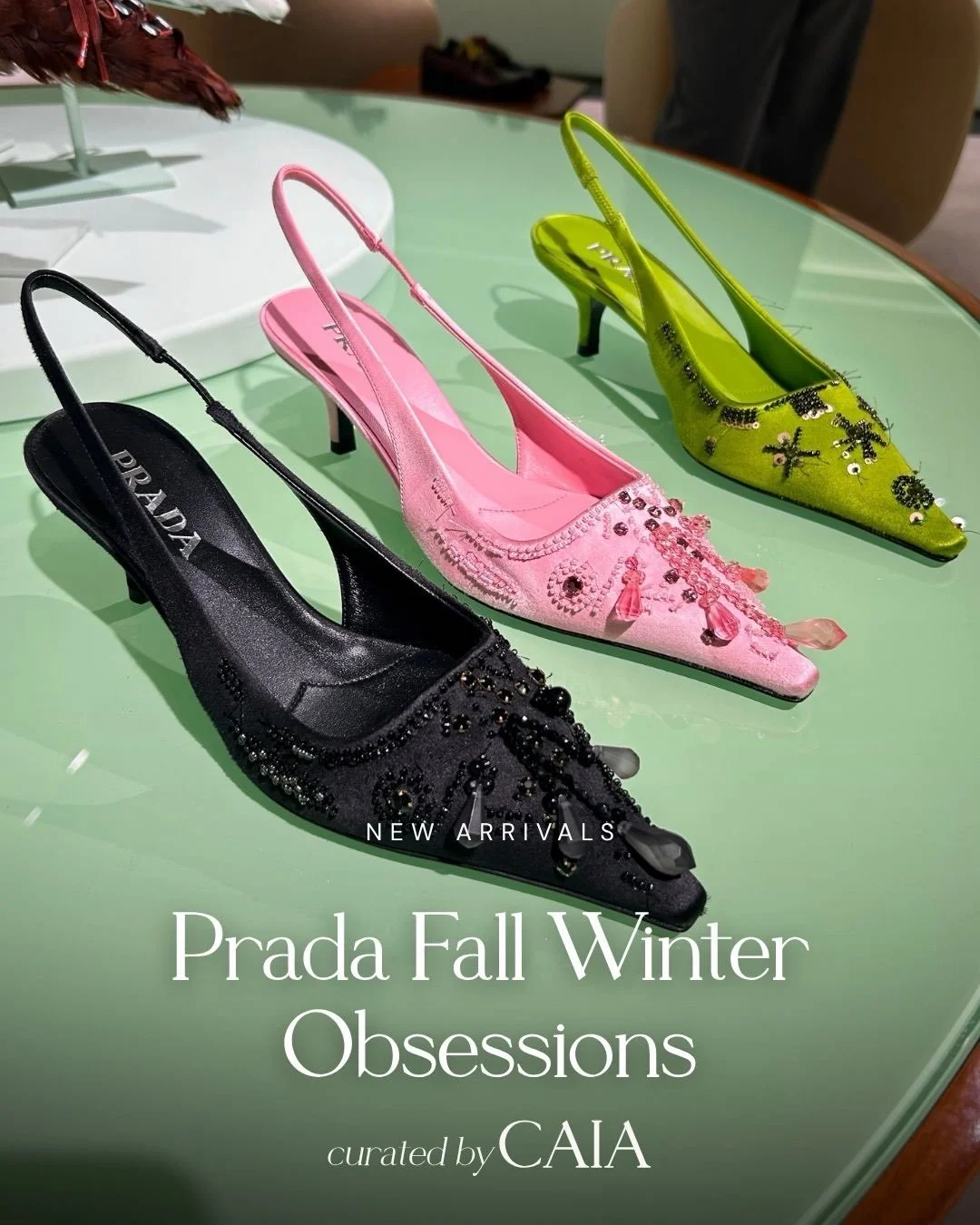 Prada&rsquo;s new-season mood: a little strange, a little romantic, impossible to ignore. Embellished slingbacks in candy pink, acid green, and black steal the show; scattered with crystals, beads, and unexpected details that feel more like jewelry t