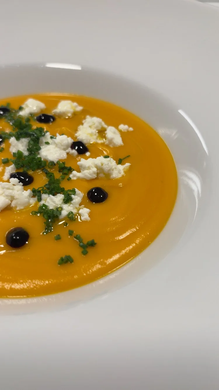 Orange soup with caviar and chives