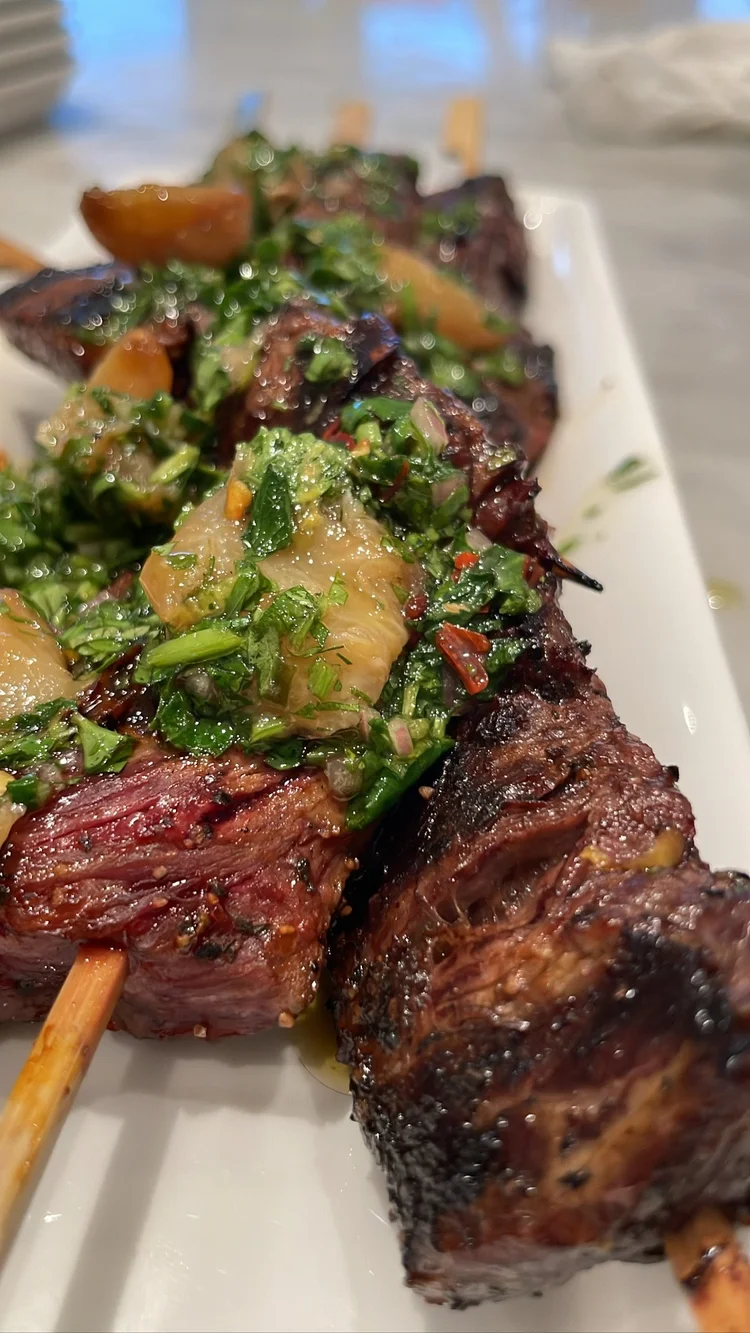Beef kebabs with herbs and vegetables