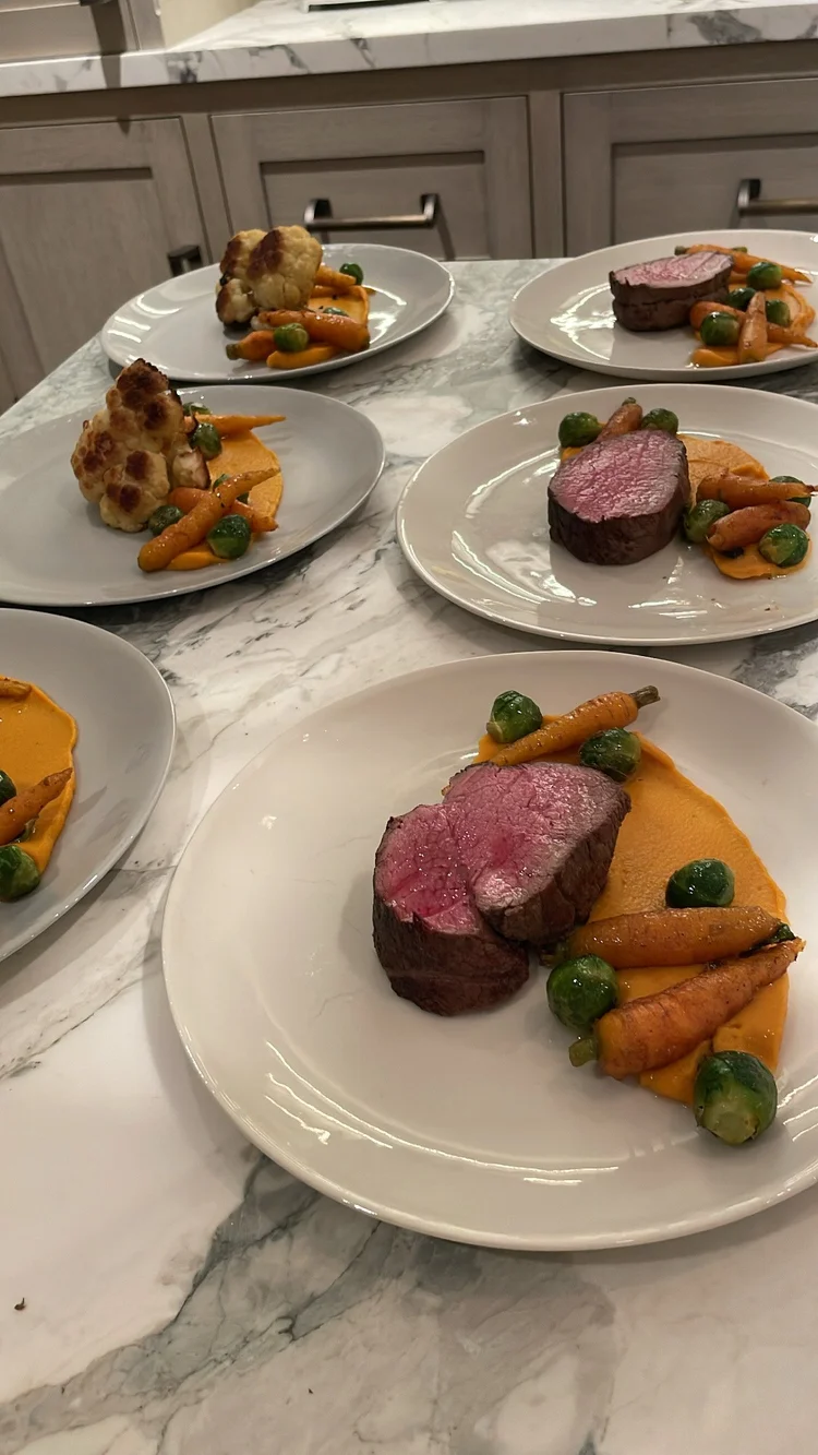 Beef tenderloin with roasted carrots and Brussels sprouts