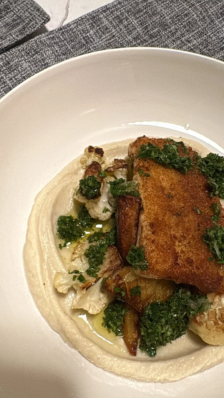 Breaded fish with mashed potatoes and cauliflower