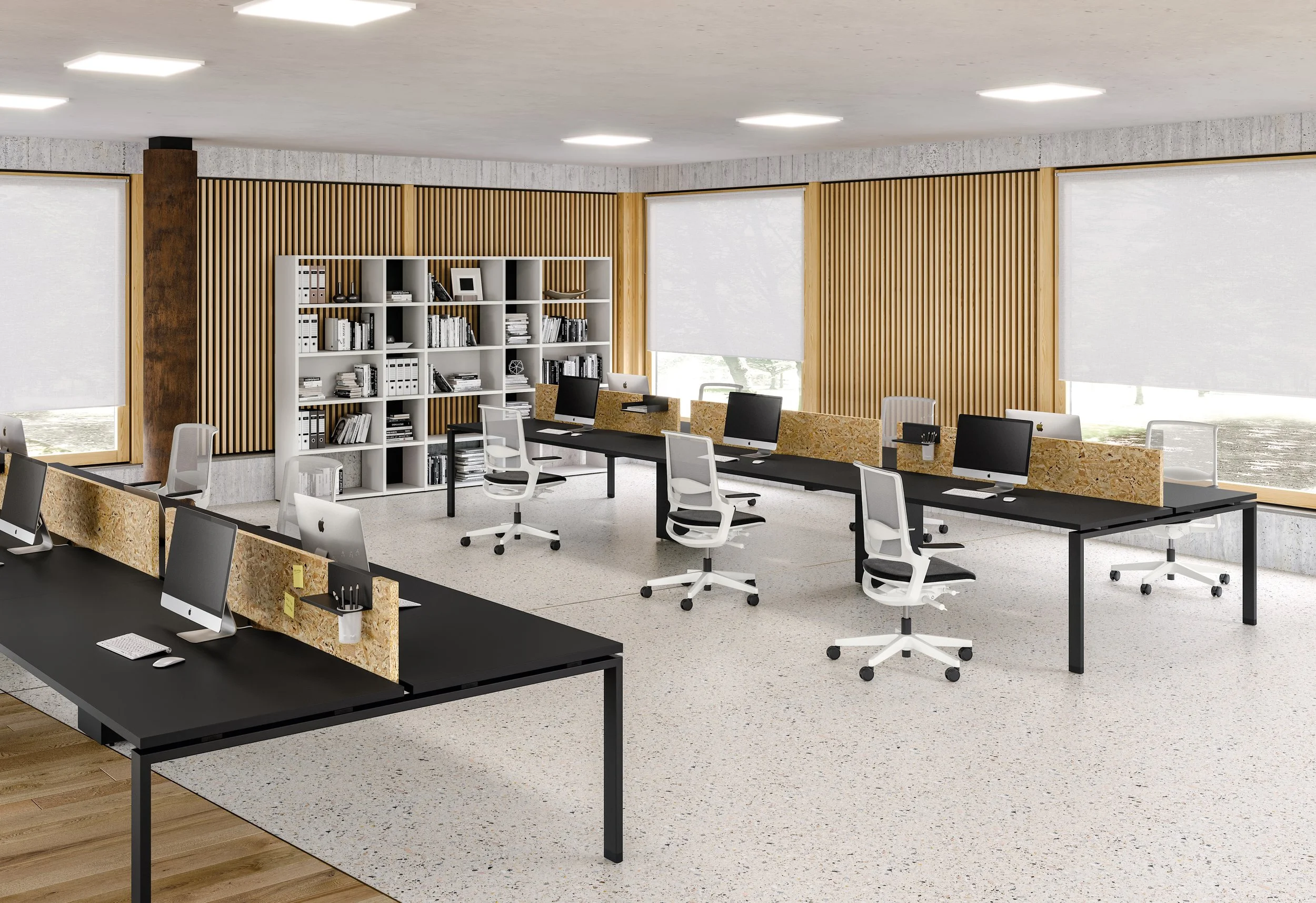 Modern office with black desks, white office chairs, desktop computers, bookshelf, large windows, and wooden wall panels.