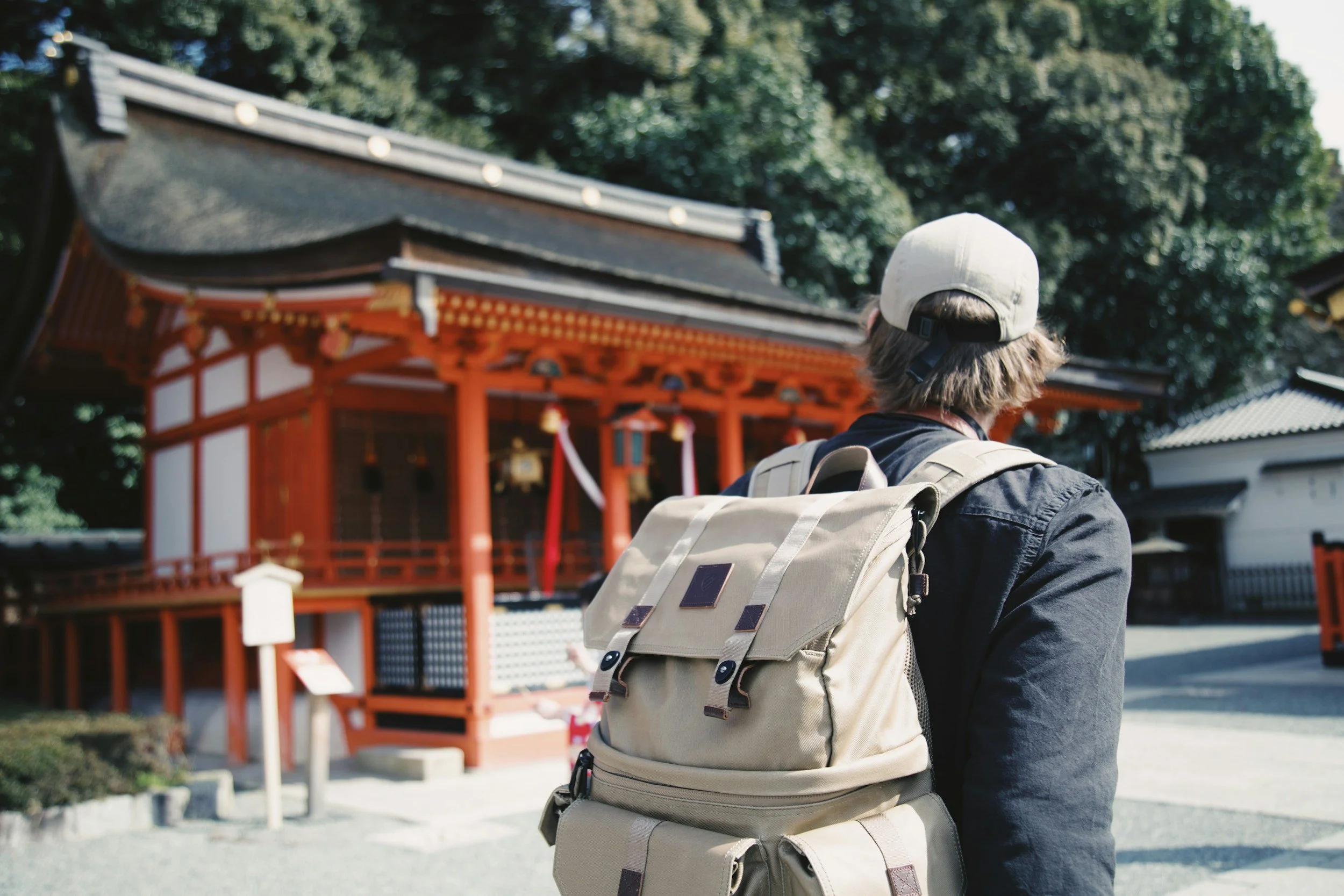 Traveler visiting a shrine during a private tour in Japan