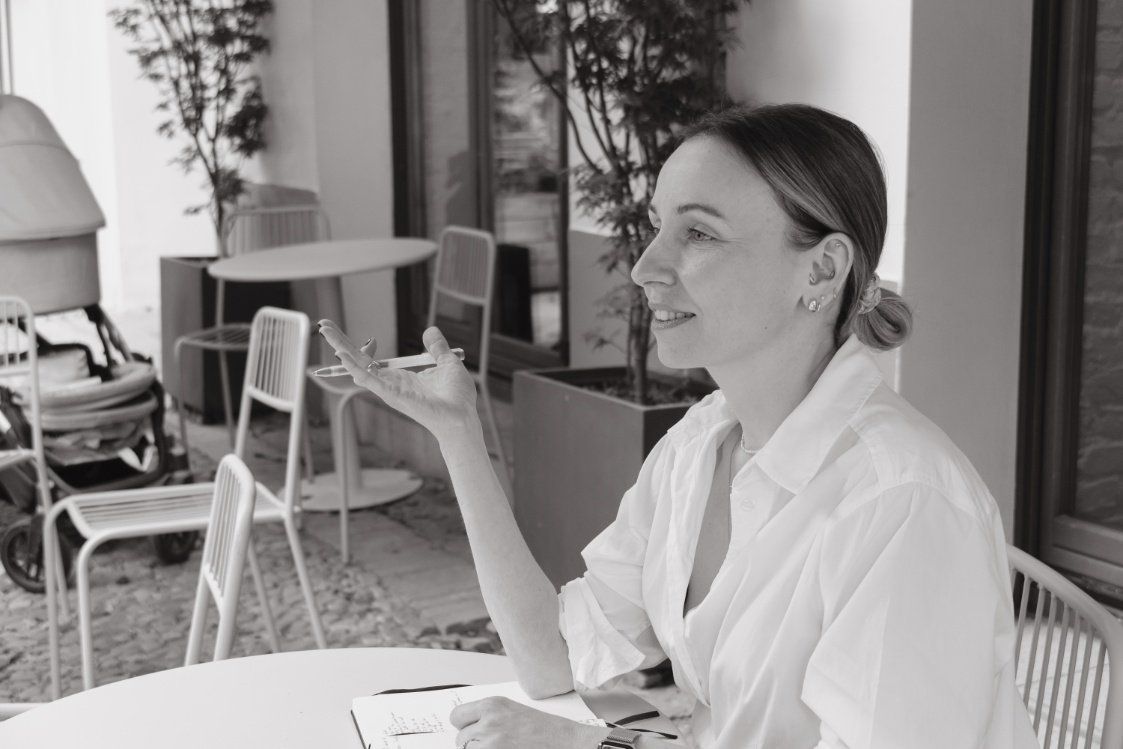 Woman working through business complexity - strategy and systems coaching