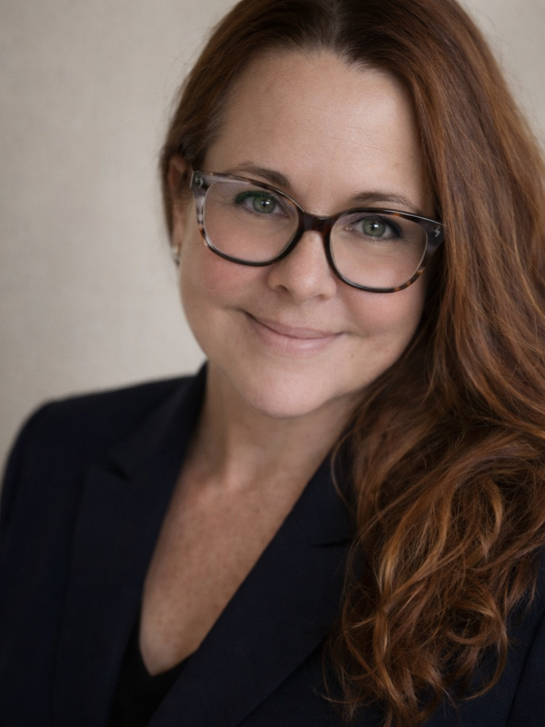 Profile picture of Sonya wearing glasses.