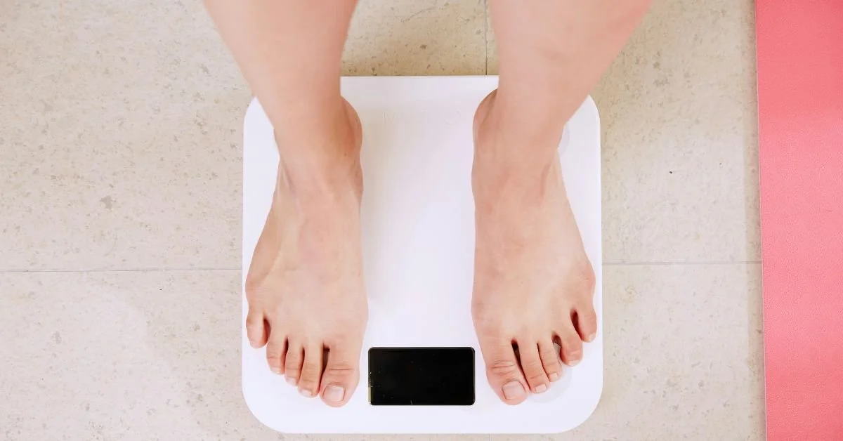 two feet standing on scales