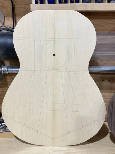 The soundboard with the rosette channel cut into it